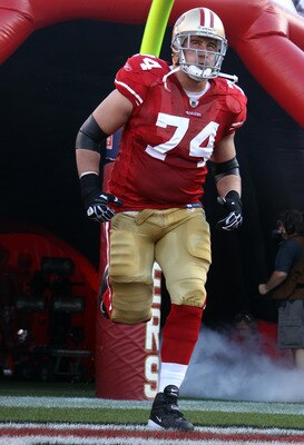 SAN FRANCISCO - SEPTEMBER 20:  Joe Staley #74 of the San Francisco 49ers runs on to the field for their game against the New Orleans Saints at Candlestick Park on September 20, 2010 in San Francisco, California.  (Photo by Ezra Shaw/Getty Images)