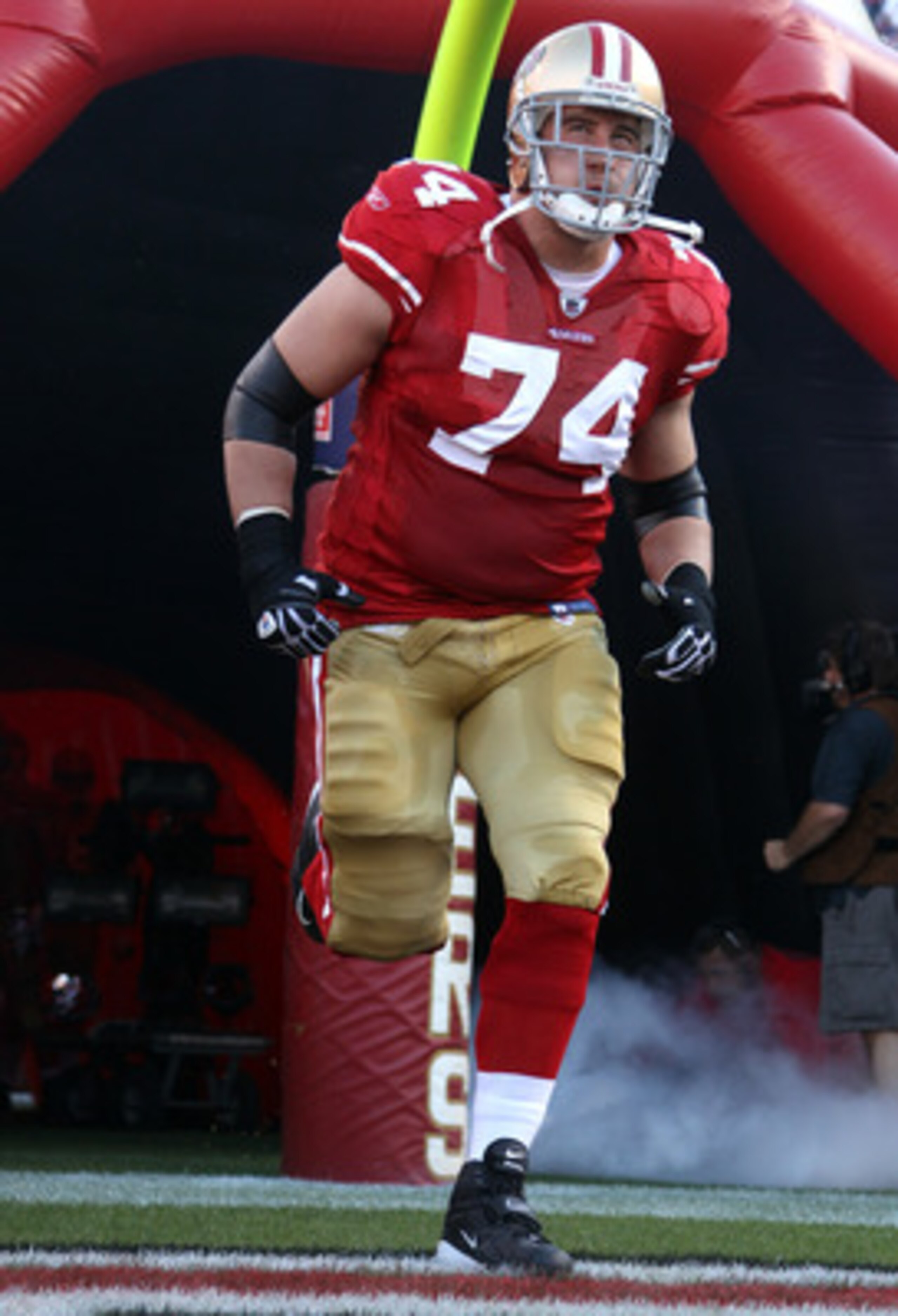 SAN FRANCISCO - SEPTEMBER 20:  Joe Staley #74 of the San Francisco 49ers runs on to the field for their game against the New Orleans Saints at Candlestick Park on September 20, 2010 in San Francisco, California.  (Photo by Ezra Shaw/Getty Images)