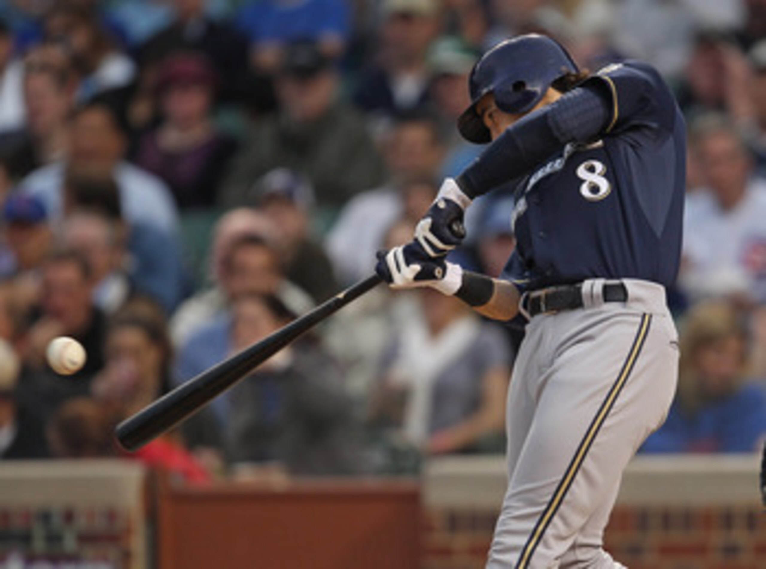 CHICAGO, IL - JUNE 14: Ryan Braun #8 of the Milwaukee Brewers hits a single against the Chicago Cubs at Wrigley Field on June 14, 2011 in Chicago, Illinois. (Photo by Jonathan Daniel/Getty Images)