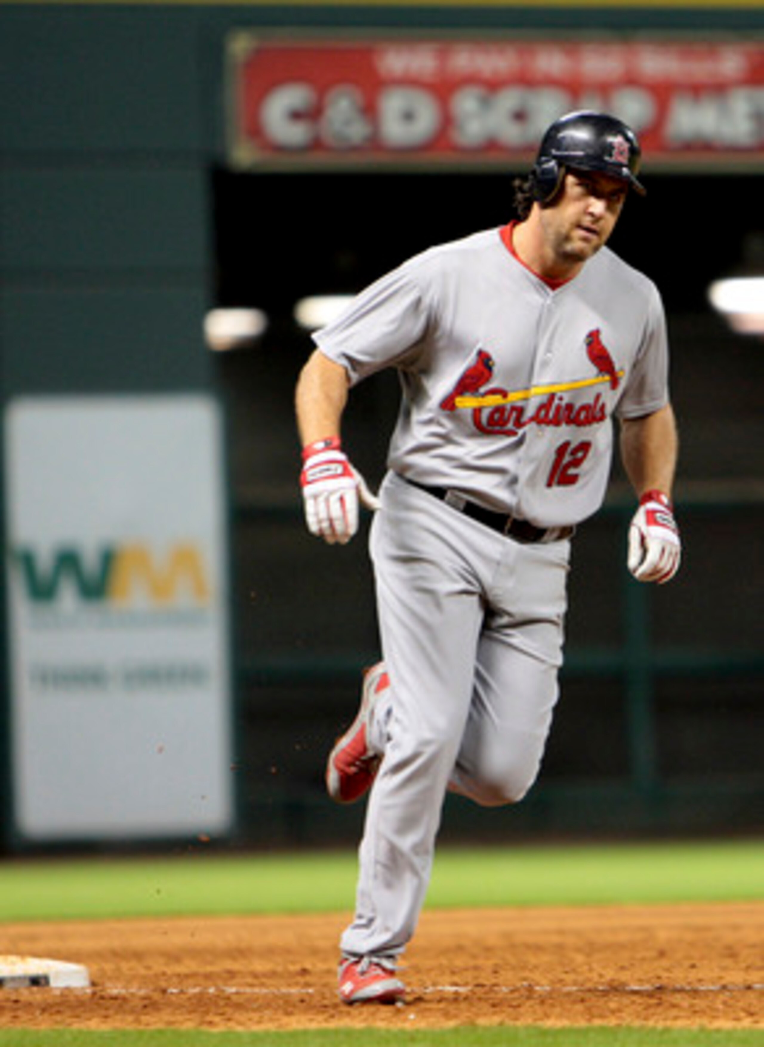 HOUSTON - JUNE 09:  Lance Berkman #12 of the St. Louis Cardinals hits a home run in the ninth inning against the Houston Astros at Minute Maid Park on June 9, 2011 in Houston, Texas.  (Photo by Bob Levey/Getty Images)