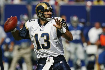 EAST RUTHERFORD, NJ - SEPTEMBER 7:  Quarterback Kurt Warner #13 of the St. Louis Rams throws a pass against the New York Giants during the game at the Giants Stadium on September 7, 2003 in East Rutherford, New Jersey. The Giants defeated the Rams 23-13.