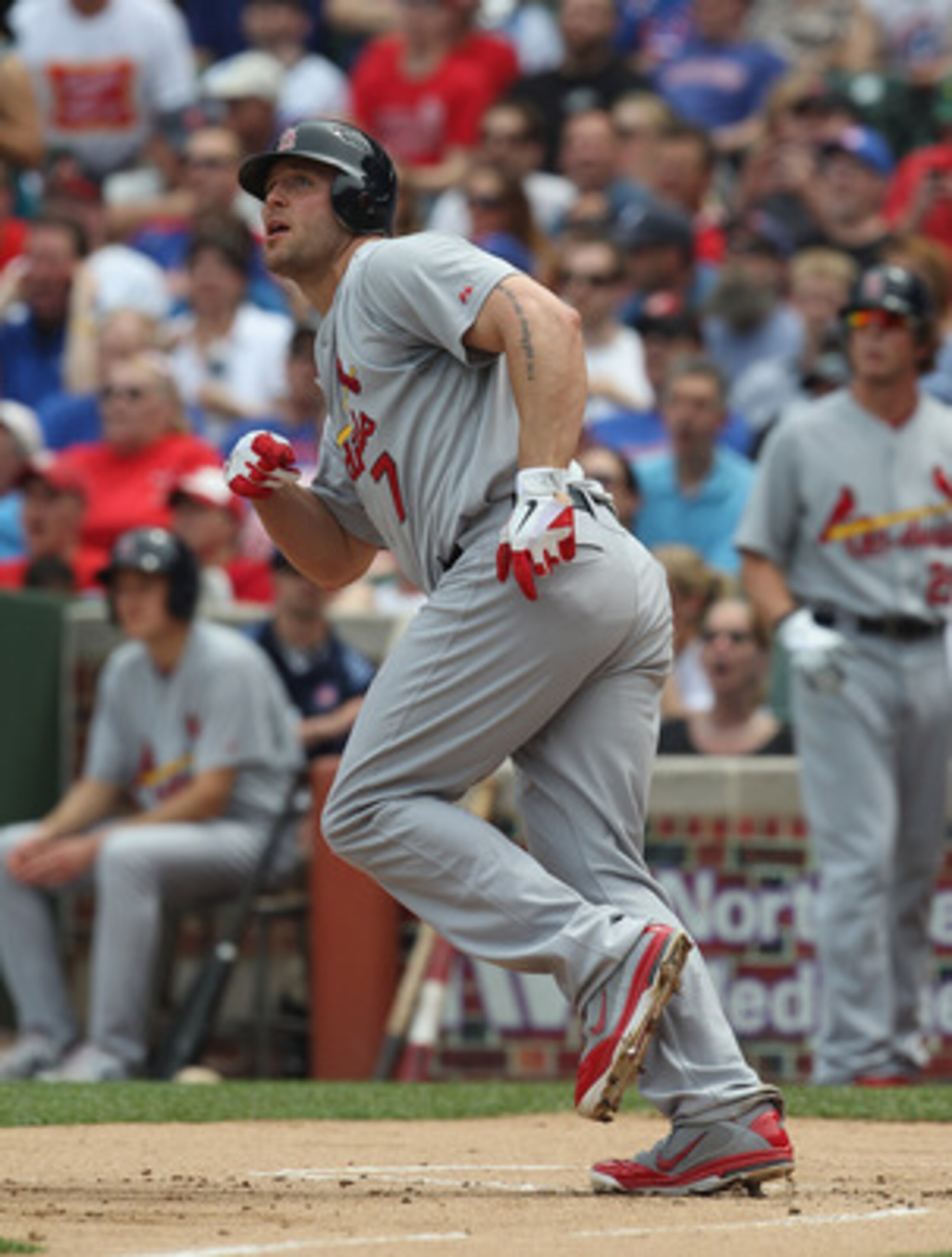CHICAGO, IL - MAY 12:  Matt Holliday #7 of the St. Louis Cardinals runs after hitting the ball against the Chicago Cubs at Wrigley Field on May 12, 2011 in Chicago, Illinois. The Cardinals defeated the Cubs 9-1.  (Photo by Jonathan Daniel/Getty Images)