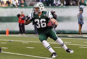 EAST RUTHERFORD, NJ - NOVEMBER 21:  Jim Leonhard #36 of the New York Jets returns a punt against the Houston Texans on November 21, 2010 at the New Meadowlands Stadium in East Rutherford, New Jersey.  (Photo by Jim McIsaac/Getty Images)