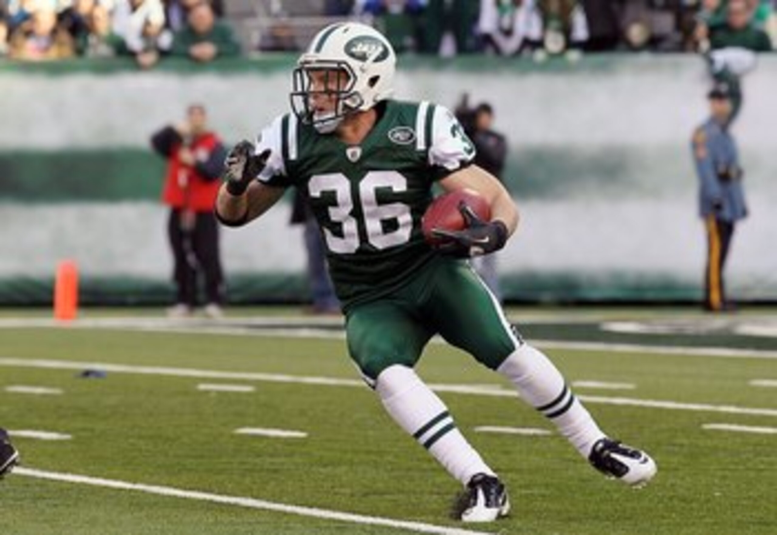 EAST RUTHERFORD, NJ - NOVEMBER 21:  Jim Leonhard #36 of the New York Jets returns a punt against the Houston Texans on November 21, 2010 at the New Meadowlands Stadium in East Rutherford, New Jersey.  (Photo by Jim McIsaac/Getty Images)