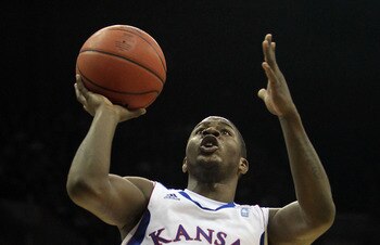 TULSA, OK - MARCH 18:  Josh Selby #32 of the Kansas Jayhawks goes up for a shot against the Boston University Terriers during the second round of the 2011 NCAA men's basketball tournament at BOK Center on March 18, 2011 in Tulsa, Oklahoma.  (Photo by Rona