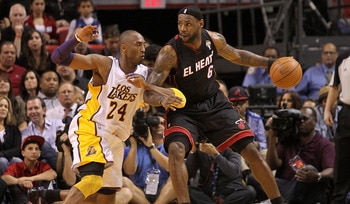 MIAMI, FL - MARCH 10:  LeBron James #6 of the Miami Heat posts up Kobe Bryant #24 of  the Los Angeles Lakers  during a game at American Airlines Arena on March 10, 2011 in Miami, Florida. NOTE TO USER: User expressly acknowledges and agrees that, by downl