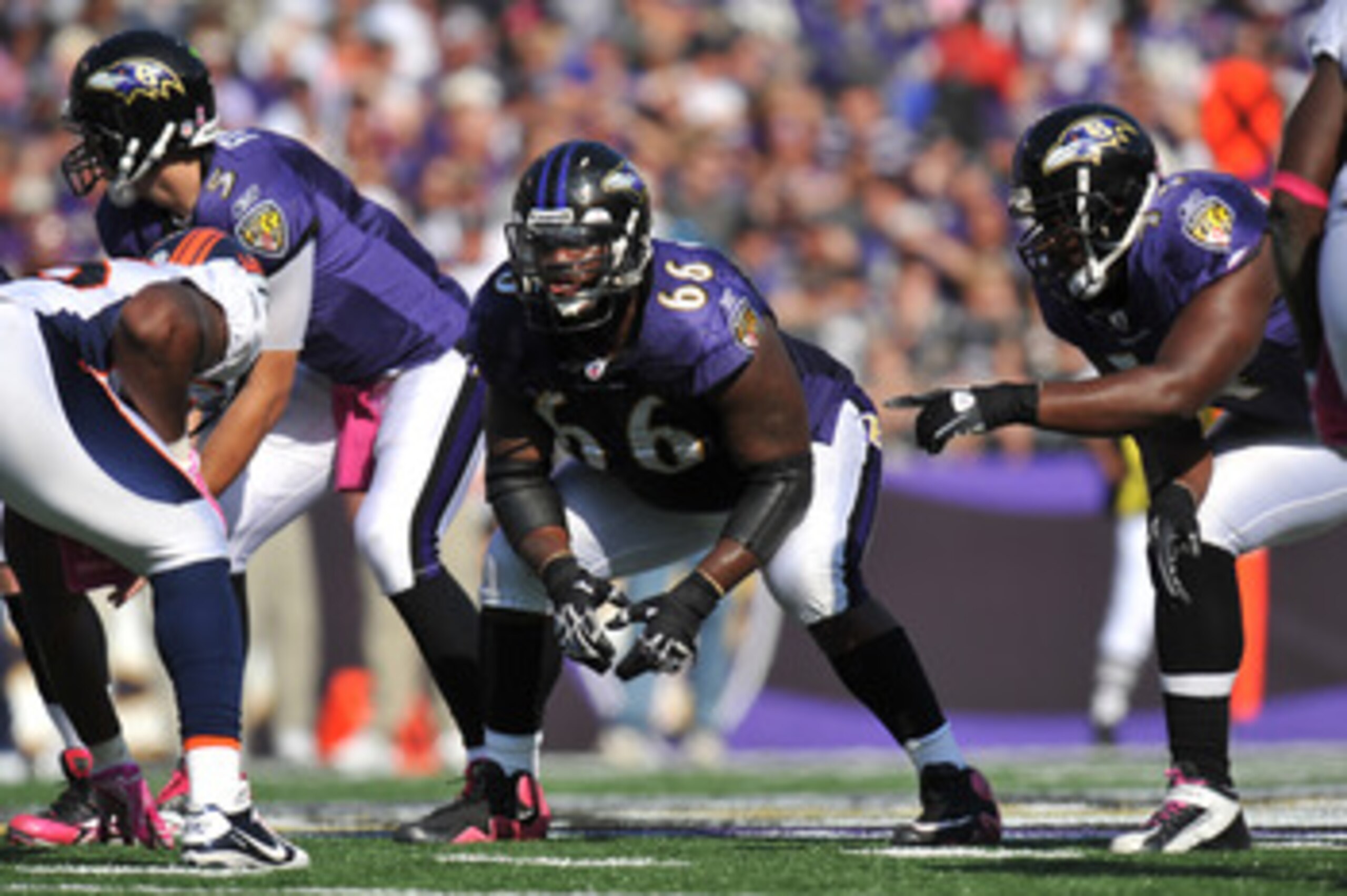 BALTIMORE, MD - OCTOBER 10: Ben Grubbs #66 of the Baltimore Ravens defends against the Denver Broncos at M&T Bank Stadium on October 10, 2010 in Baltimore, Maryland. Players wore pink in recognition of Breast Cancer Awareness Month. The Ravens defeated th