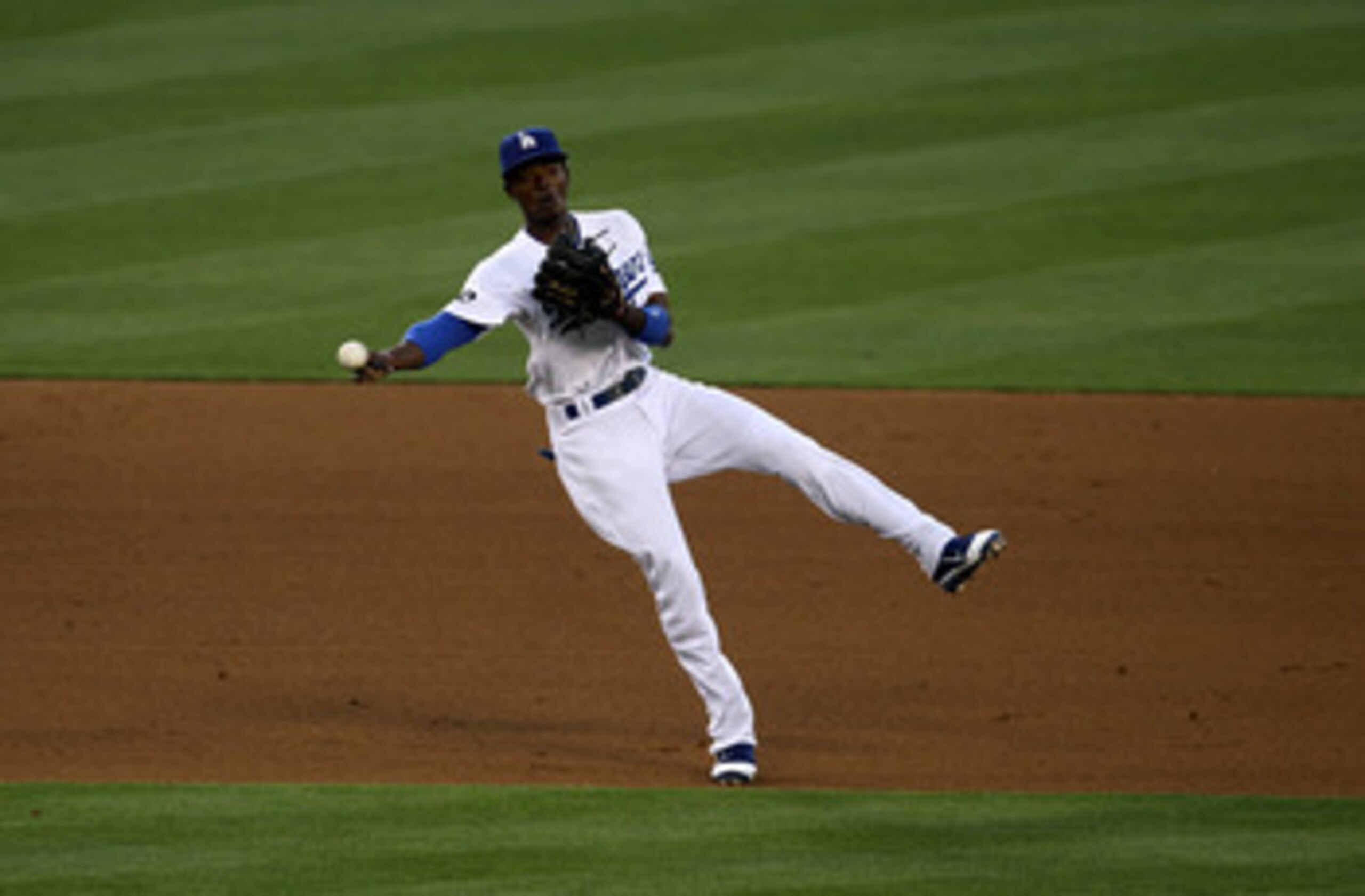 LOS ANGELES, CA - JUNE 20: Shortstop Dee Gordon #9 of the Los Angeles Dodgers throws out Danny Worth of the Detroit Tigers in the third inning on June 20, 2011 at Dodger Stadium in Los Angeles, California. (Photo by Stephen Dunn/Getty Images) LOS ANGELES, CA - JUNE 20: Shortstop Dee Gordon #9 of the Los Angeles Dodgers throws out Danny Worth of the Detroit Tigers in the third inning on June 20, 2011 at Dodger Stadium in Los Angeles, California. (Photo by Stephen Dunn/Getty Images)