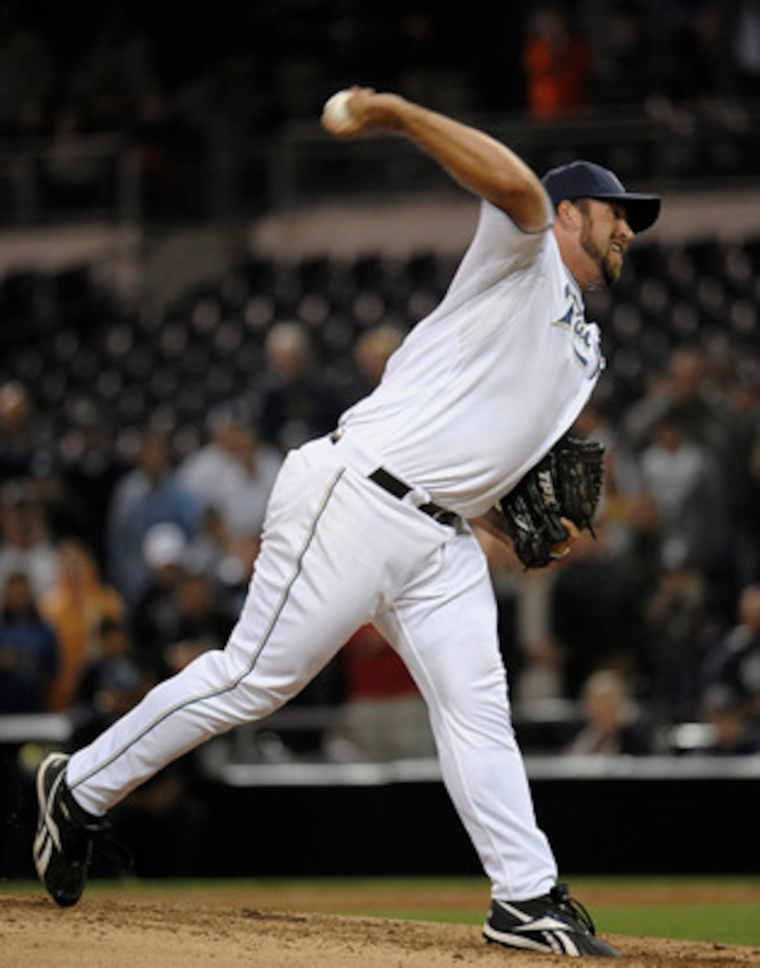 SAN DIEGO, CA - JUNE 7: Heath Bell #21 of the San Diego Padres pitches during the ninth inning of a baseball game against the Colorado Rockies at Petco Park on June 7, 2011 in San Diego, California.  (Photo by Denis Poroy/Getty Images)