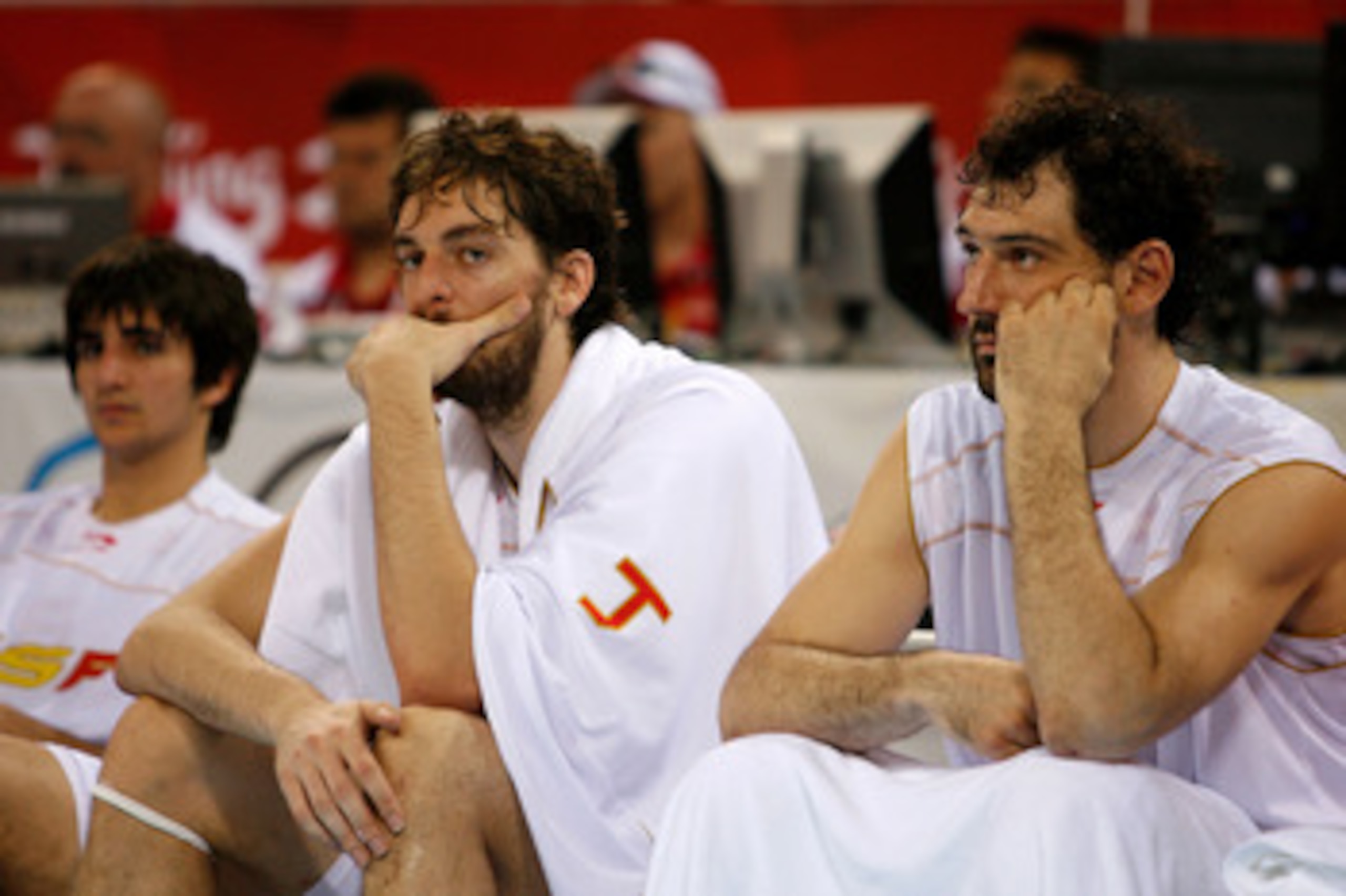 BEIJING - AUGUST 24:  (L-R) Ricky Rubio #6, Pau Gasol #13 and Jorge Joaquin Garbajosa #15 of Spain sit on the bench during the gold medal game against the United States during Day 16 of the Beijing 2008 Olympic Games at the Beijing Olympic Basketball Gymn