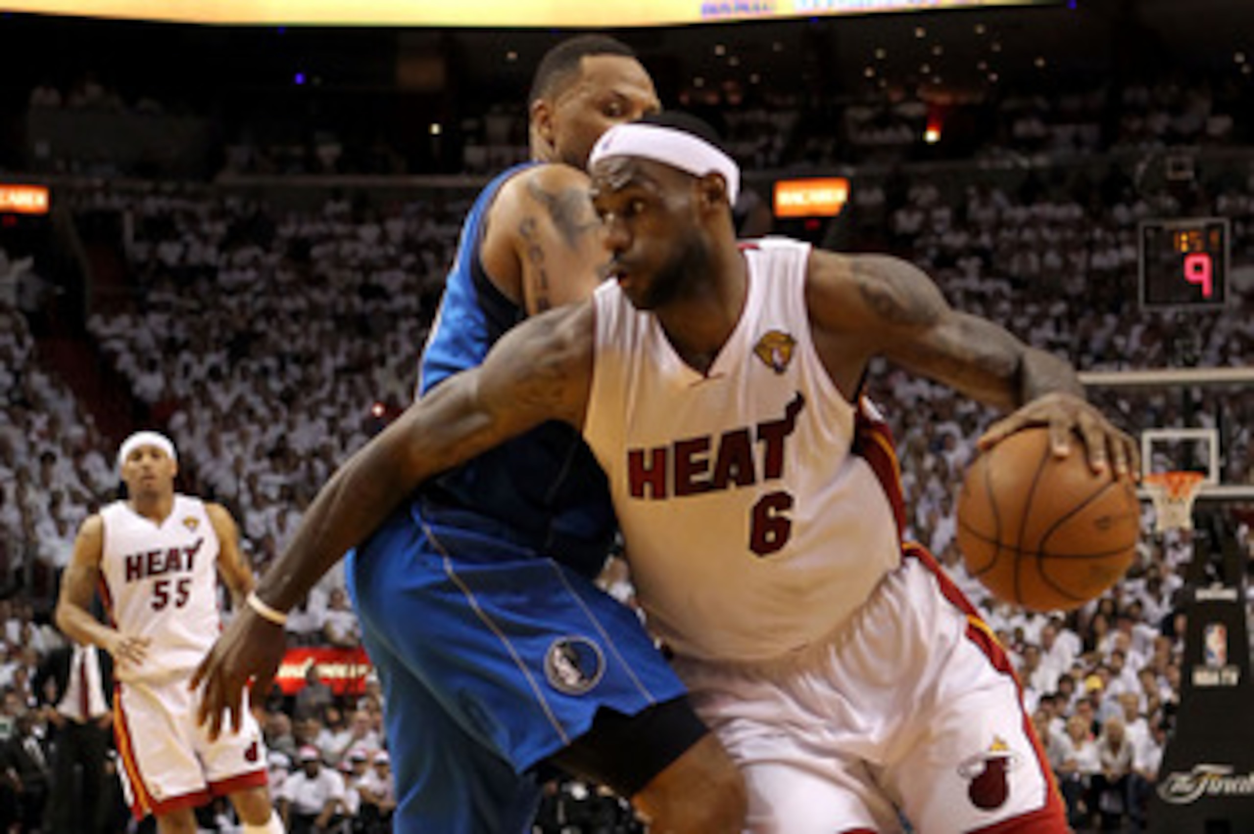 MIAMI, FL - JUNE 12:  LeBron James #6 of the Miami Heat drives against Shawn Marion #0 of the Dallas Mavericks in the second half of Game Six of the 2011 NBA Finals at American Airlines Arena on June 12, 2011 in Miami, Florida. NOTE TO USER: User expressl