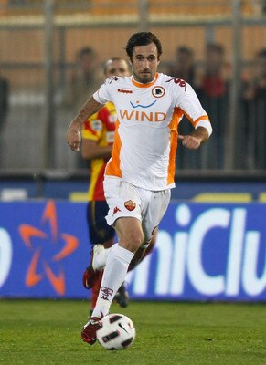 LECCE, ITALY - MARCH 04:  Mirko Vucinic of Roma during the Serie A match between US Lecce and AS Roma at Stadio Via del Mare on March 4, 2011 in Lecce, Italy.  (Photo by Maurizio Lagana/Getty Images)