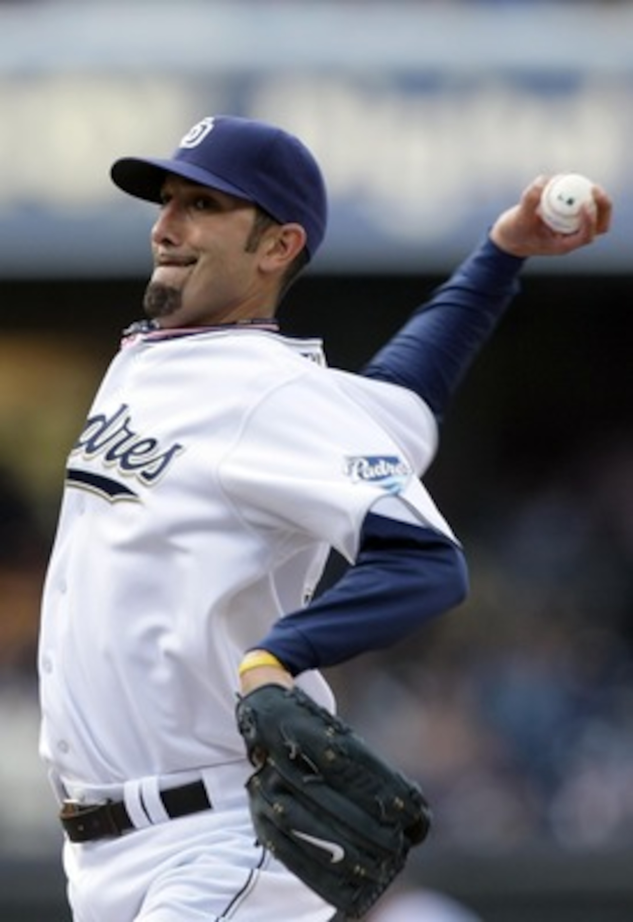 SAN DIEGO, CA - APRIL 5:  Pitcher Mike Adams #37 of the San Diego Padres throws from the mound during the Padres 3-1 win over the San Francisco Giants at Petco Park on April 5, 2011 in San Diego, California. (Photo by Donald Miralle/Getty Images)