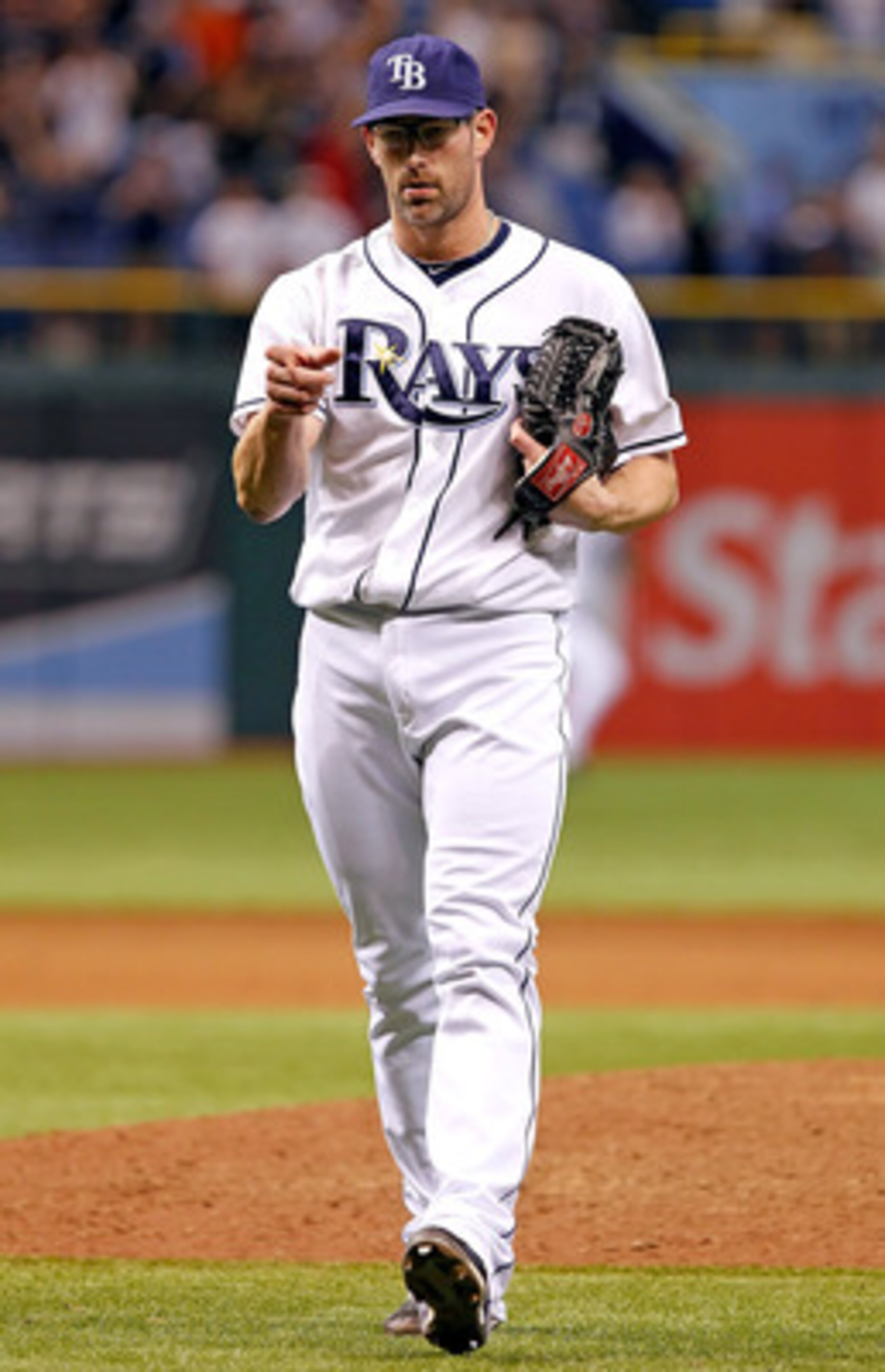 ST. PETERSBURG, FL - JUNE 17:  Pitcher Kyle Farnsworth #43 of the Tampa Bay Rays celebrates his save against the Florida Marlins at Tropicana Field on June 17, 2011 in St. Petersburg, Florida.  (Photo by J. Meric/Getty Images)