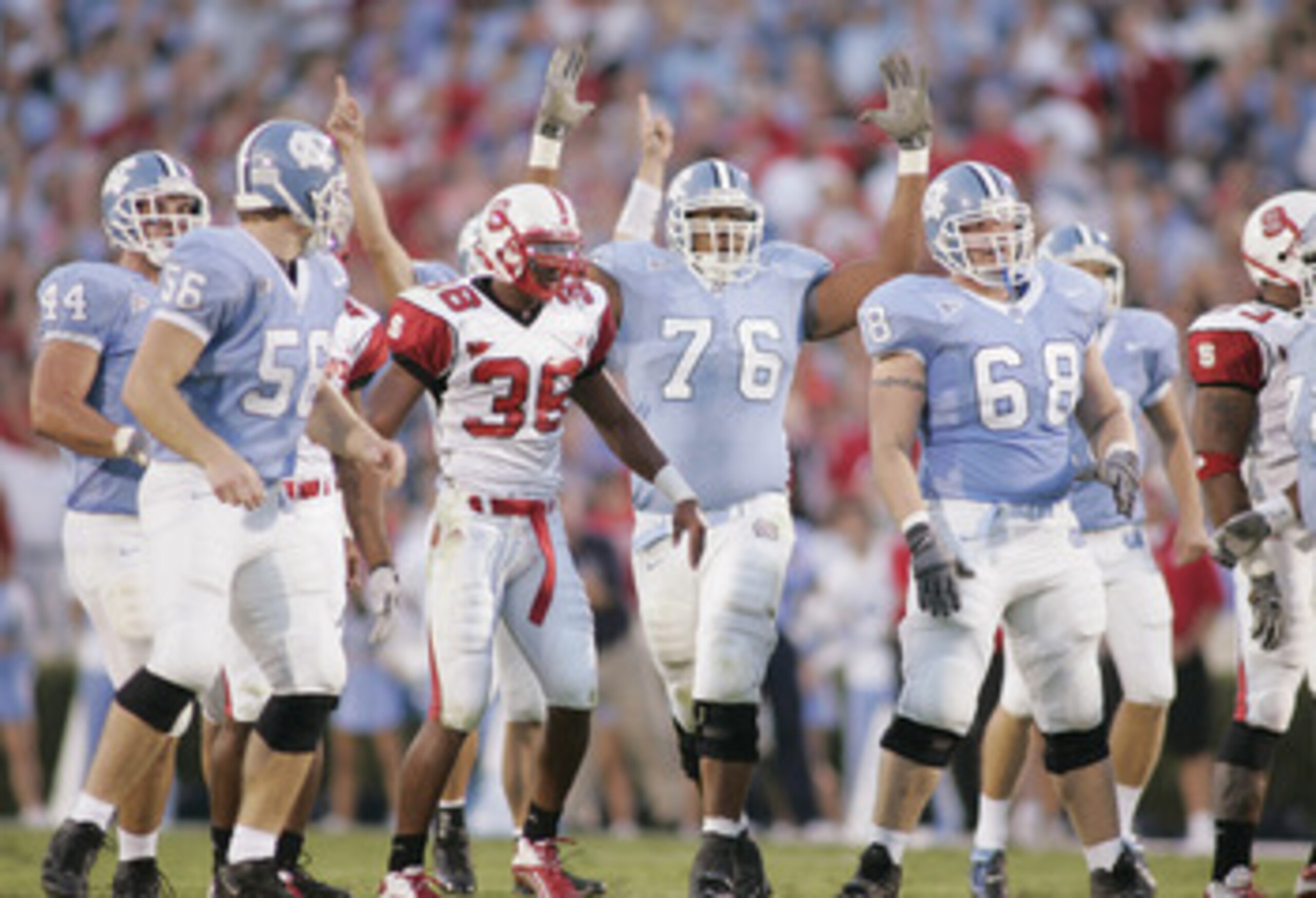 CHAPEL HILL, NC - OCTOBER 9:  The North Carolina Tar Heels celebrate during the game against the North Carolina State Wolfpack on October 9, 2004 at Kenan Stadium Stadium in Chapel Hill, North Carolina. North Carolina defeated North Carolina State 30-24.
