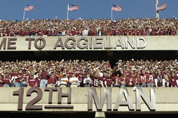 COLLEGE STATION, TX - NOVEMBER 28:  Texas A&M University Aggies fans, sometimes referred to as the 12th Man, stand during the game against the University of Texas at Austin Longhorns, at Kyle Field on November 28, 2003 in College Station, Texas.  The Texa