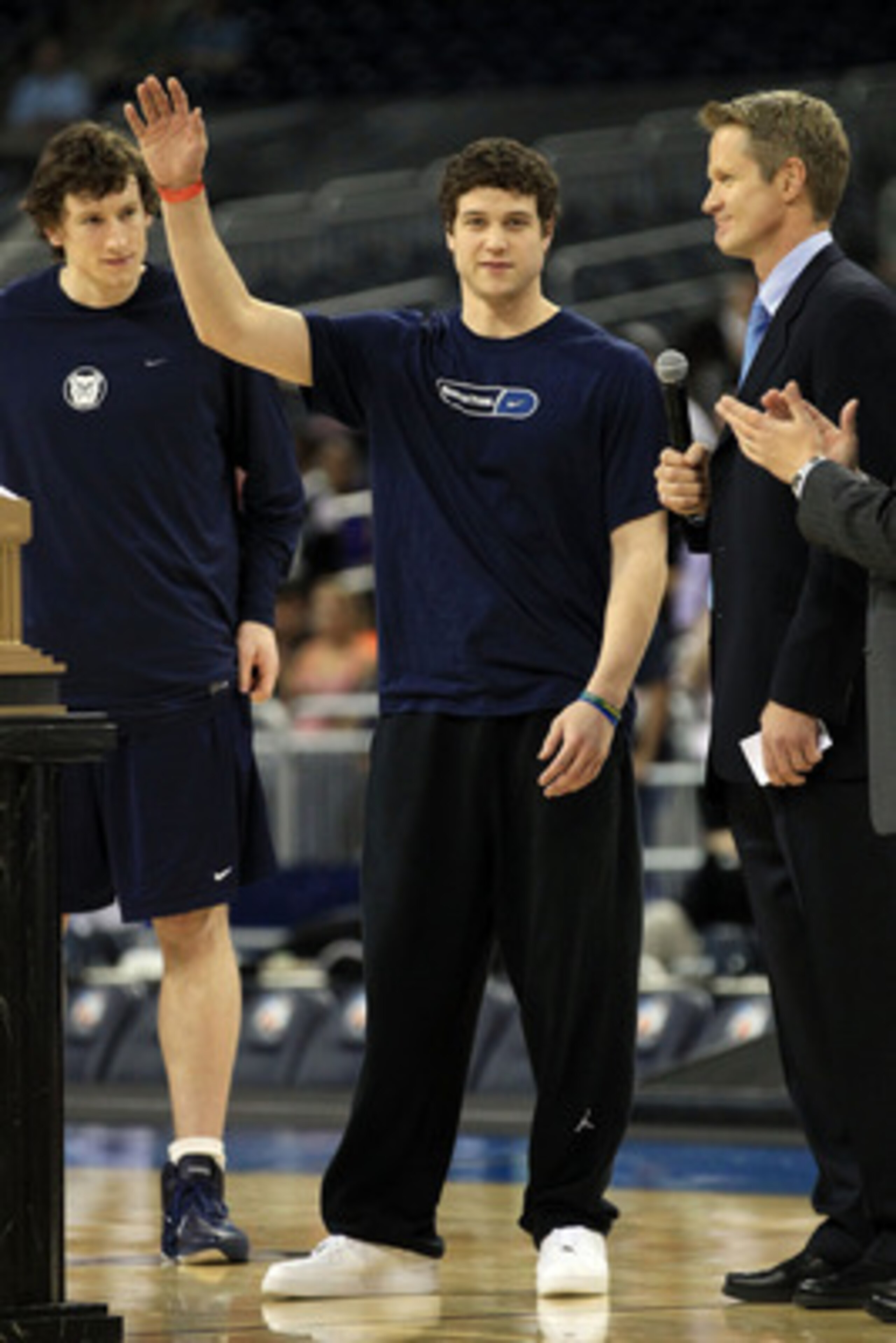 HOUSTON, TX - APRIL 01: Jimmer Fredette of BYU is named the most outstanding senior student-athlete as it broadcaster Steve Kerr presents him with the award during practice prior to the 2011 Final Four of the NCAA Division I Men's Basketball Tournament a HOUSTON, TX - APRIL 01: Jimmer Fredette of BYU is named the most outstanding senior student-athlete as it broadcaster Steve Kerr presents him with the award during practice prior to the 2011 Final Four of the NCAA Division I Men's Basketball Tournament a
