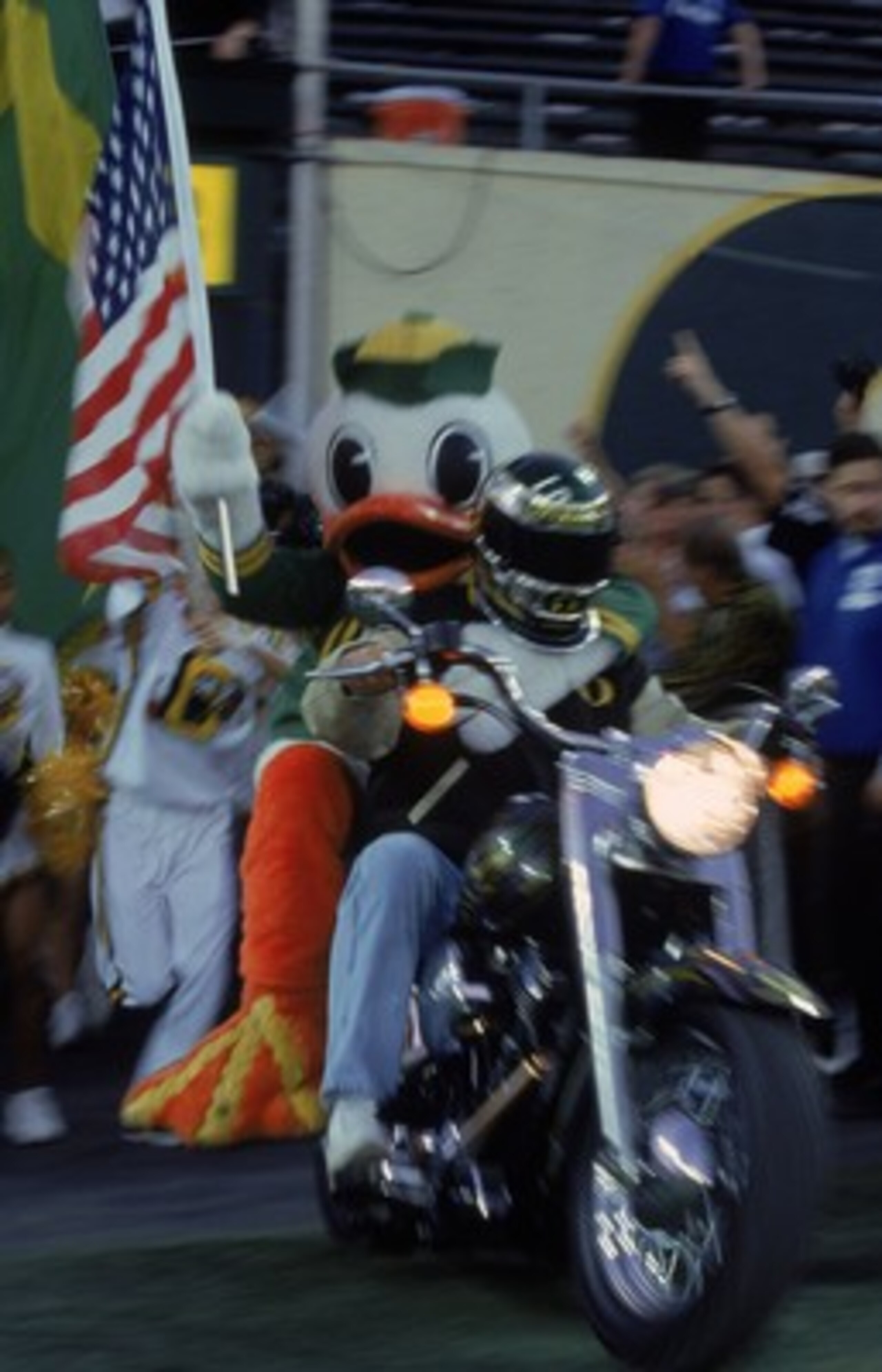 22 Sep 2001:  The Mascot of the Oregon Ducks riding on the back of a motorcycle carrying the flag during the game against the University of Southern California (USC) Trojans at the Autzen Stadium in Eugene, Oregon.  The Ducks defeated the Trojans 24-22. M