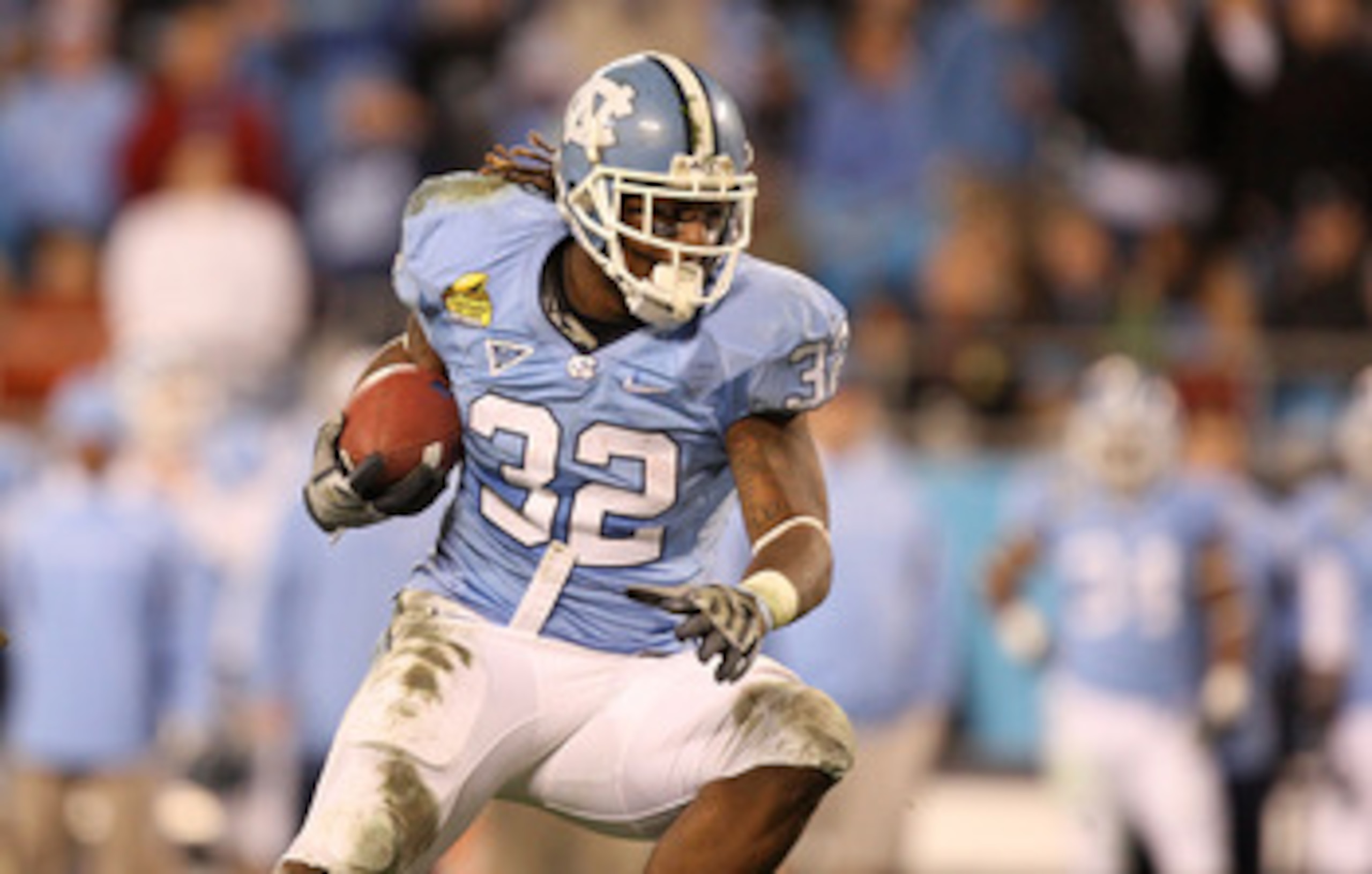 CHARLOTTE, NC - DECEMBER 26:  Ryan Houston #32 of the North Carolina Tar Heels runs with the ball against the Pittsburgh Panthers during their game on December 26, 2009 in Charlotte, North Carolina.  (Photo by Streeter Lecka/Getty Images)