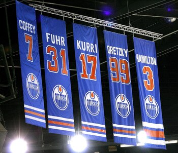 EDMONTON, CANADA - OCTOBER 18:  The number 7 Paul Coffey Retirement banner takes its place in the rafters beside those of Edmonton Oilers greats Grant Fuhr, Jari Kurri, Wayne Gretzky and Al Hamilton, during a special ceremony honouring Paul Coffey on Octo