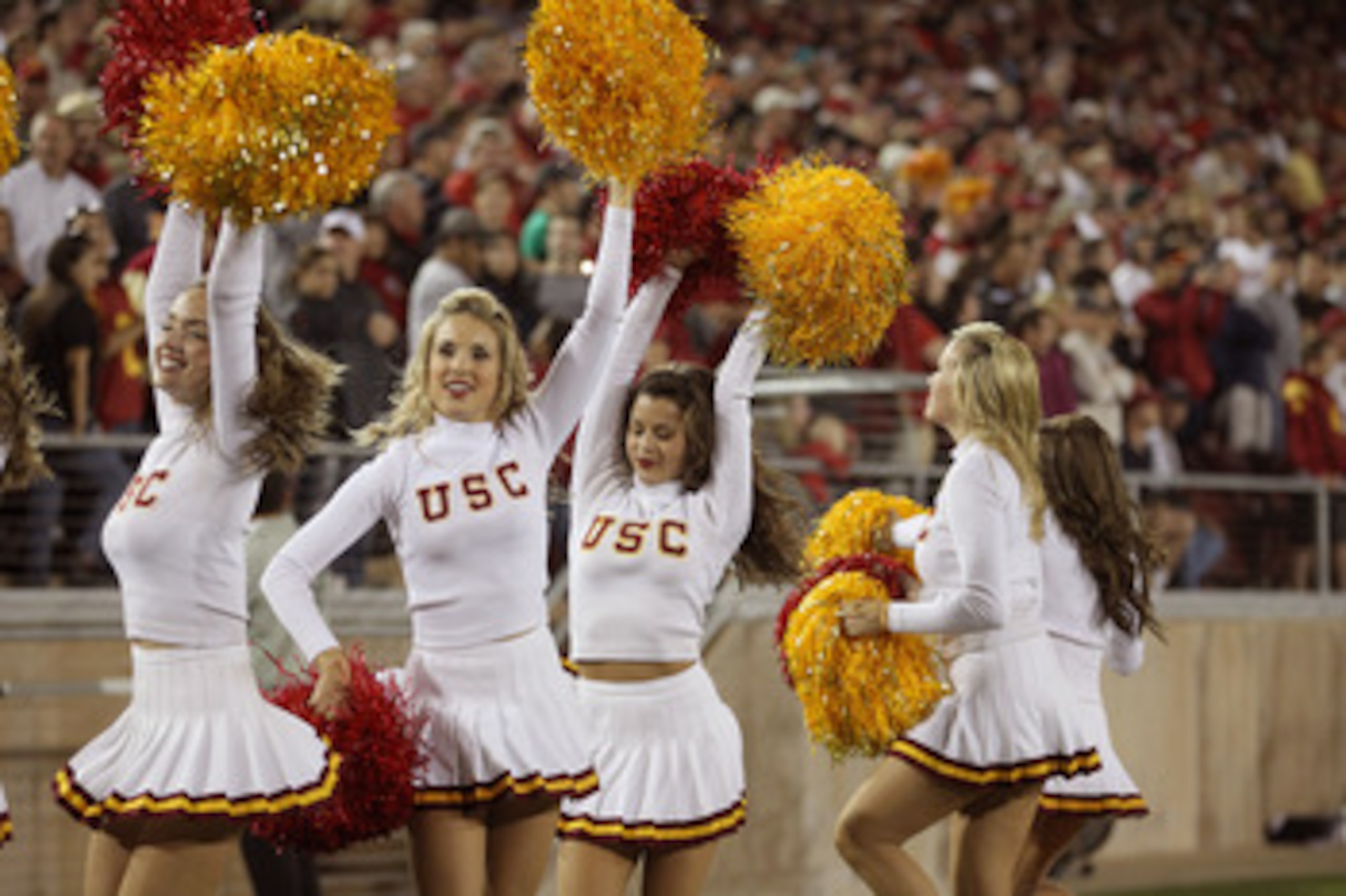 PALO ALTO, CA - OCTOBER 09:  The USC Trojan cheerleaders cheer for their team during their game against the Stanford Cardinal at Stanford Stadium on October 9, 2010 in Palo Alto, California.  (Photo by Ezra Shaw/Getty Images)