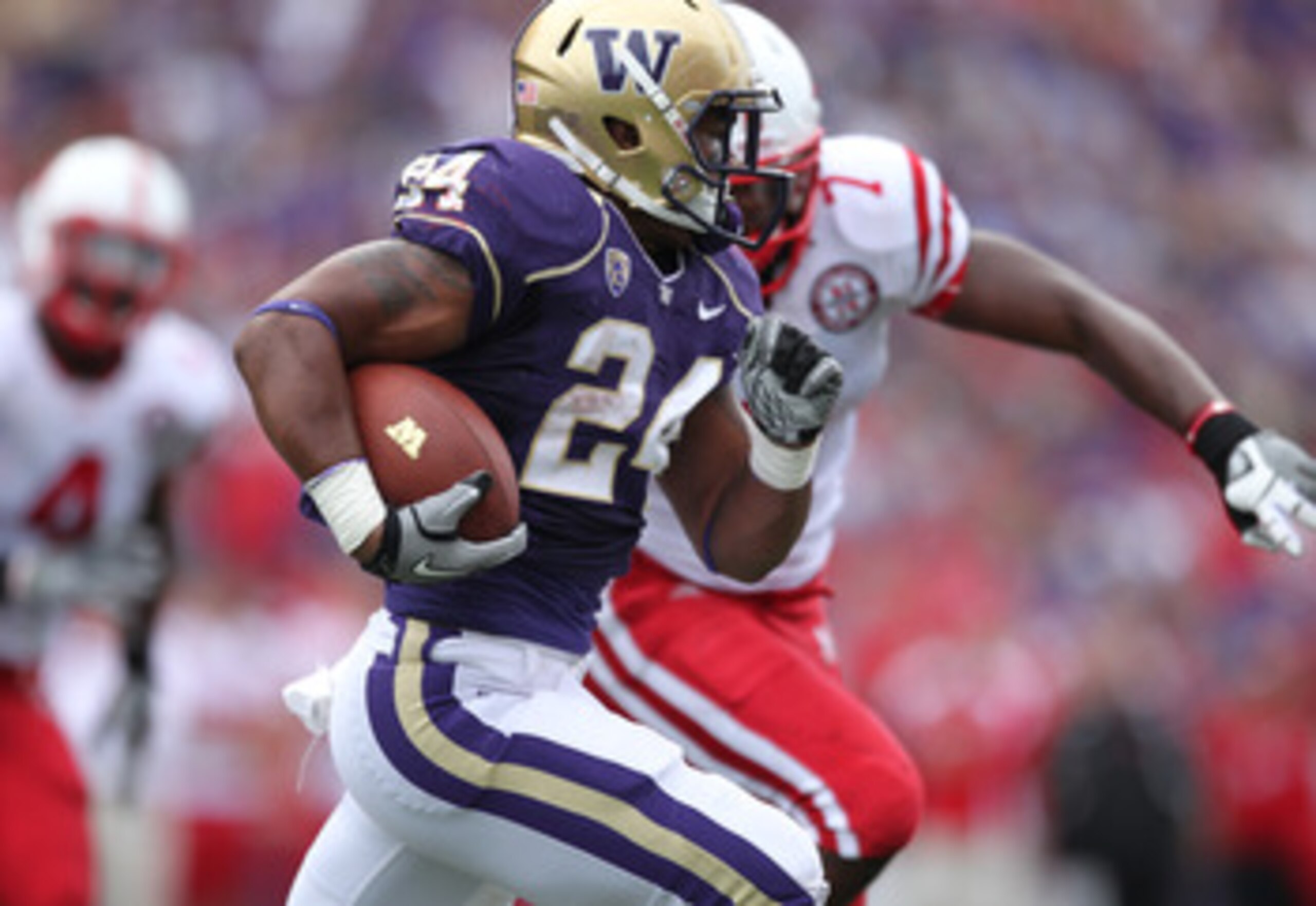 SEATTLE - SEPTEMBER 18: Running back Jesse Callier #24 of the Washington Huskies rushes against the Nebraska Cornhuskers on September 18, 2010 at Husky Stadium in Seattle, Washington. (Photo by Otto Greule Jr/Getty Images)