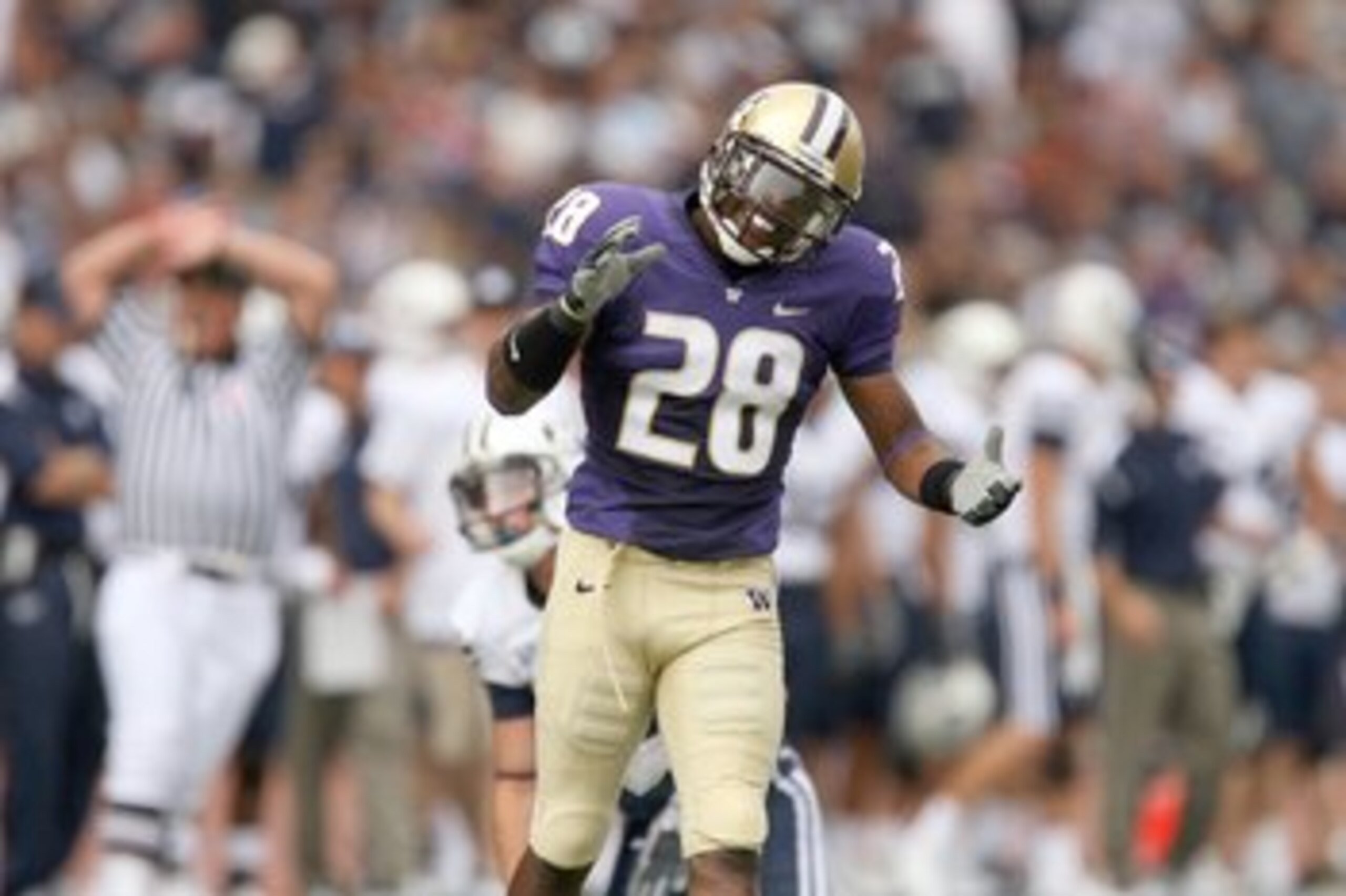 SEATTLE - SEPTEMBER 6:  Quinton Richardson #28 of the Washington Huskies reacts after a play during their game against the BYU Cougars on September 6, 2008 at Husky Stadium in Seattle, Washington. The Cougars defeated the Huskies 28-27. (Photo by Otto Gre