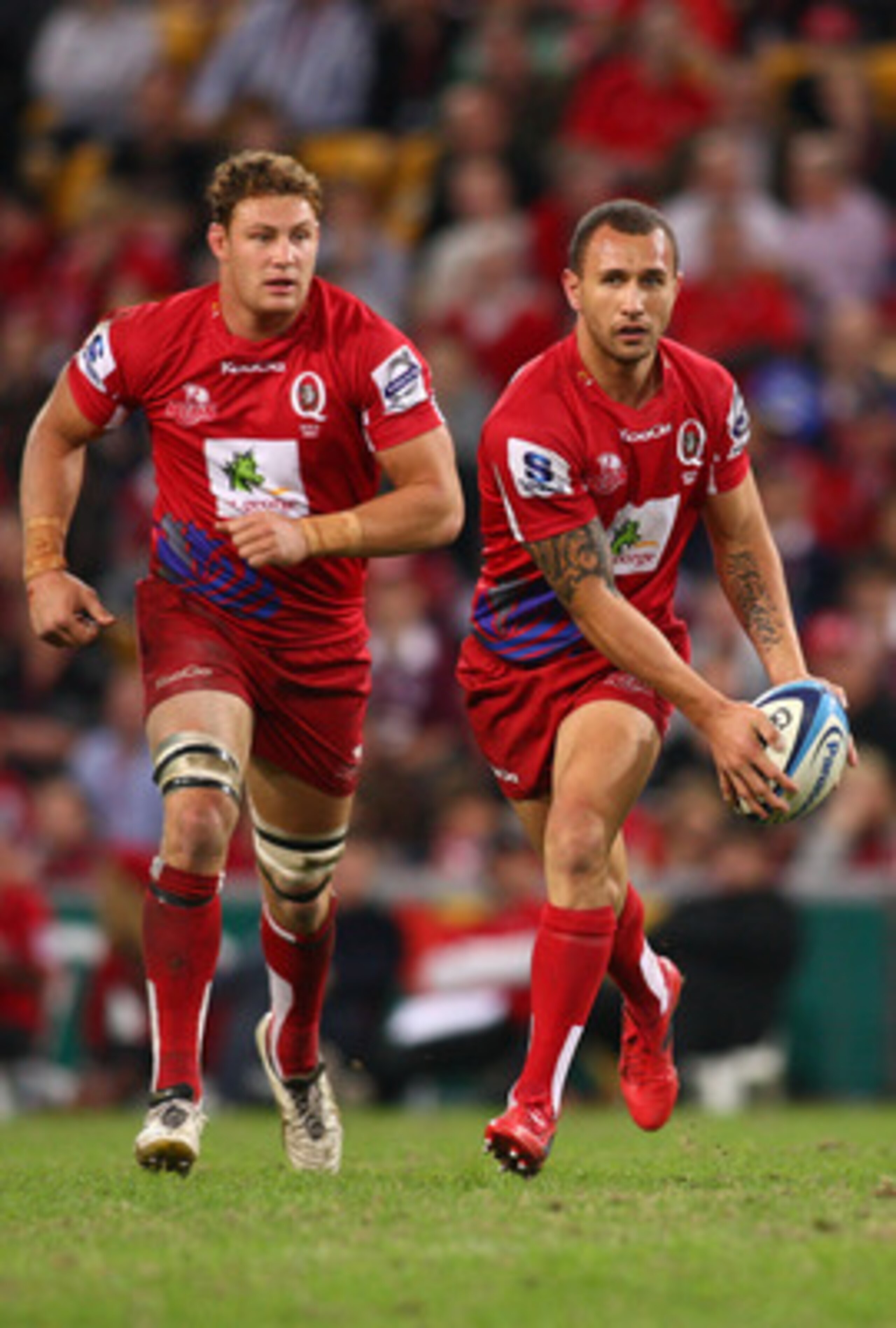 BRISBANE, AUSTRALIA - JUNE 04: Quade Cooper of the Reds runs with the ball during the round 16 Super Rugby match between the Reds and the Brumbies at Suncorp Stadium on June 4, 2011 in Brisbane, Australia. (Photo by Jonathan Wood/Getty Images) BRISBANE, AUSTRALIA - JUNE 04: Quade Cooper of the Reds runs with the ball during the round 16 Super Rugby match between the Reds and the Brumbies at Suncorp Stadium on June 4, 2011 in Brisbane, Australia. (Photo by Jonathan Wood/Getty Images)