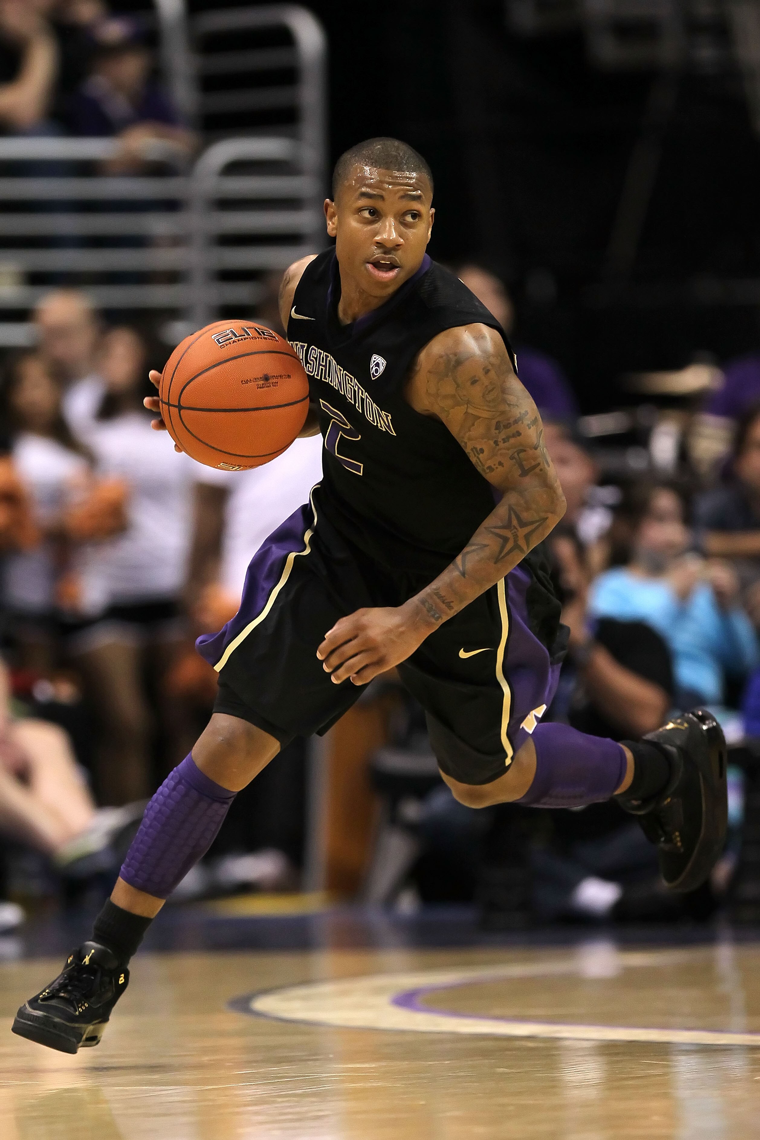 LOS ANGELES, CA - MARCH 12:  Isaiah Thomas #2 of the Washington Huskies moves the ball while taking on the Arizona Wildcats in the championship game of the 2011 Pacific Life Pac-10 Men's Basketball Tournament at Staples Center on March 12, 2011 in Los Ang
