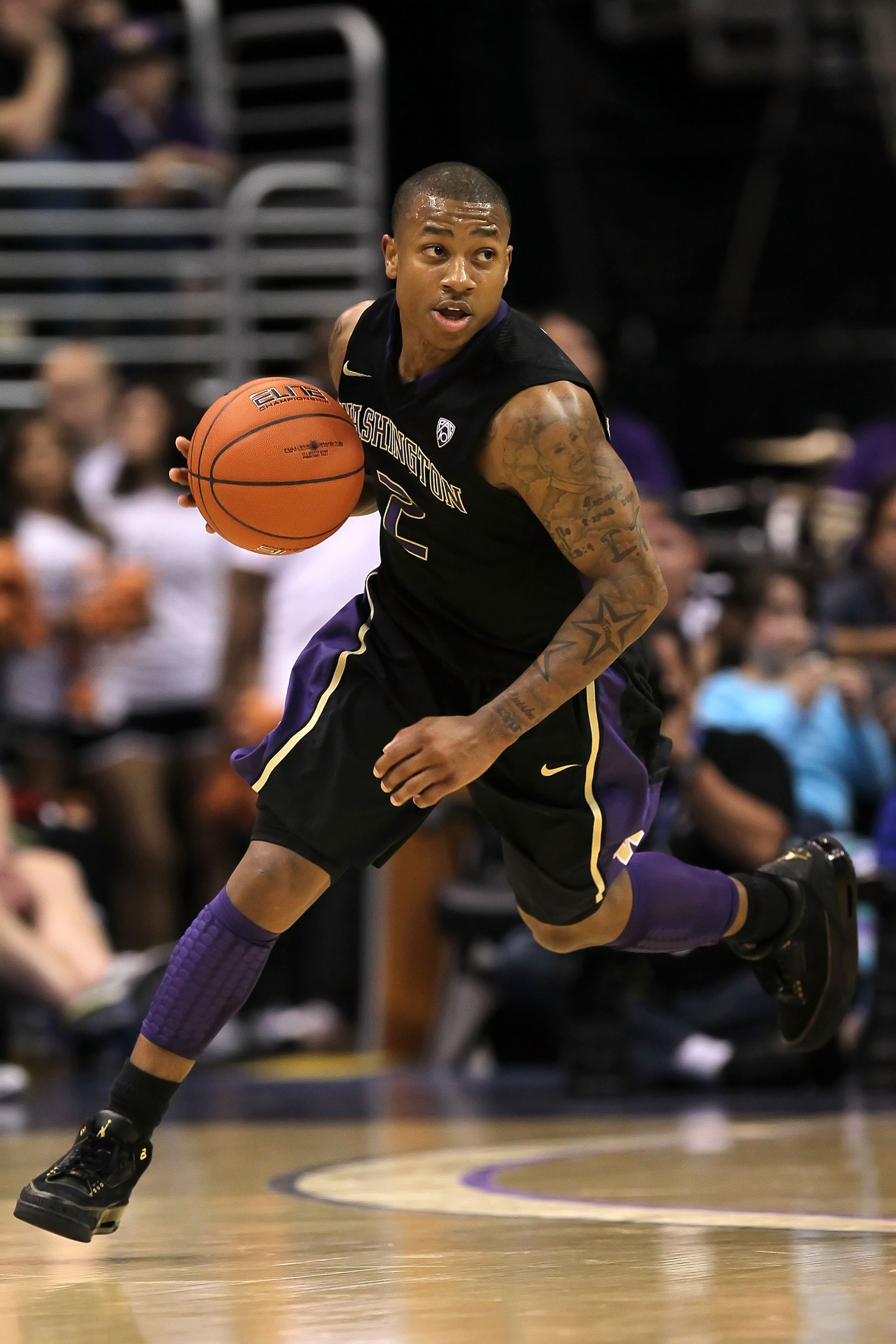 LOS ANGELES, CA - MARCH 12:  Isaiah Thomas #2 of the Washington Huskies moves the ball while taking on the Arizona Wildcats in the championship game of the 2011 Pacific Life Pac-10 Men's Basketball Tournament at Staples Center on March 12, 2011 in Los Ang