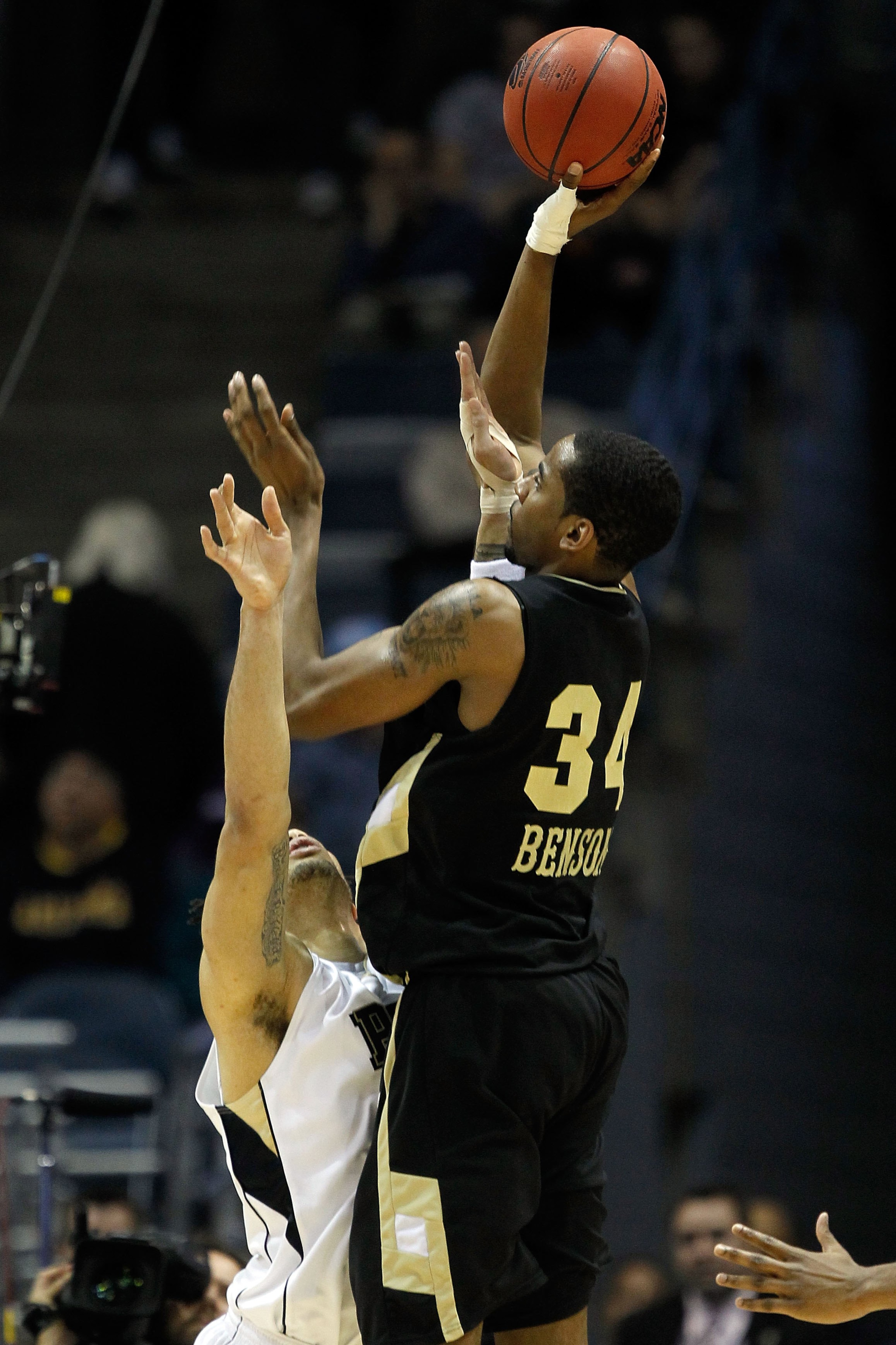 MILWAUKEE - MARCH 19:  Keith Benson #34 of the Oakland Golden Grizzlies shoots the ball over Gary McGhee #52 of the Pittsburgh Panthers in the second half during the first round of the 2010 NCAA men's basketball tournament at the Bradley Center on March 1
