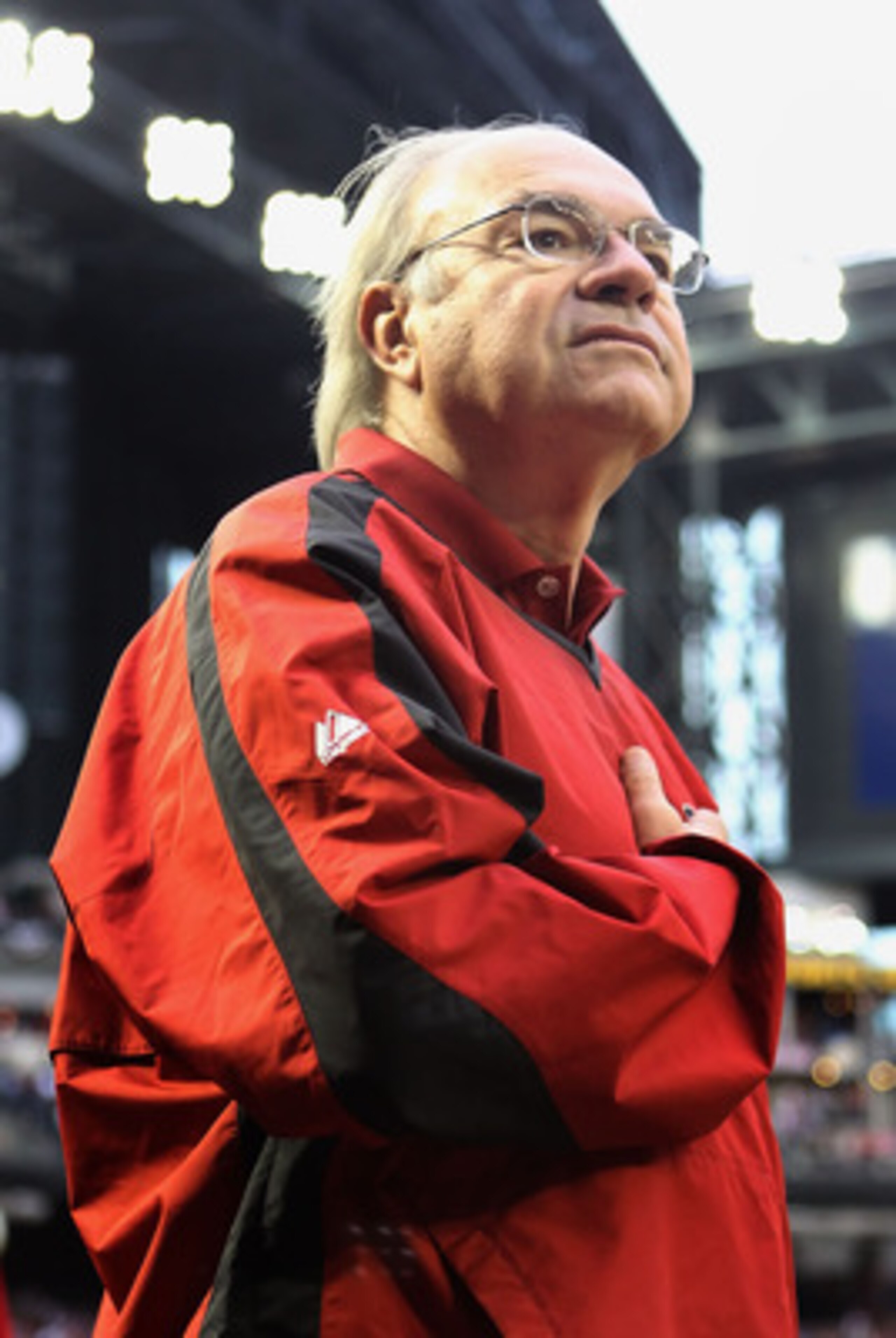 PHOENIX, AZ - APRIL 08:  Owner Ken Kendrick of the Arizona Diamondbacks stands attended for the National Anthem before the Major League Baseball home opening game against the Cincinnati Reds at Chase Field on April 8, 2011 in Phoenix, Arizona. The Diamond