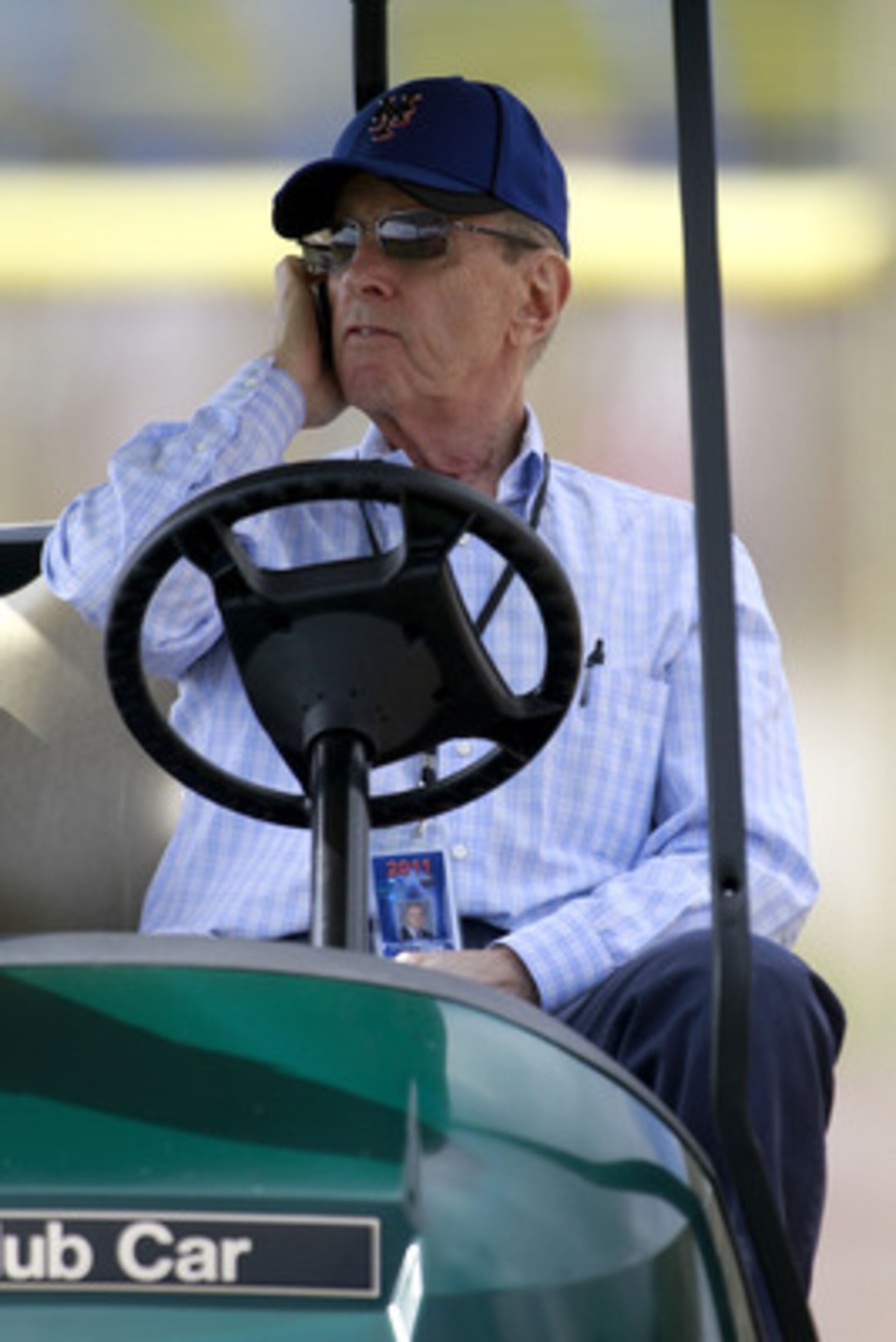 PORT ST. LUCIE, FL - FEBRUARY 17:  Owner Fred Wilpon of the New York Mets talks on the phone during spring training at Tradition Field on February 17, 2011 in Port St. Lucie, Florida.  (Photo by Marc Serota/Getty Images)