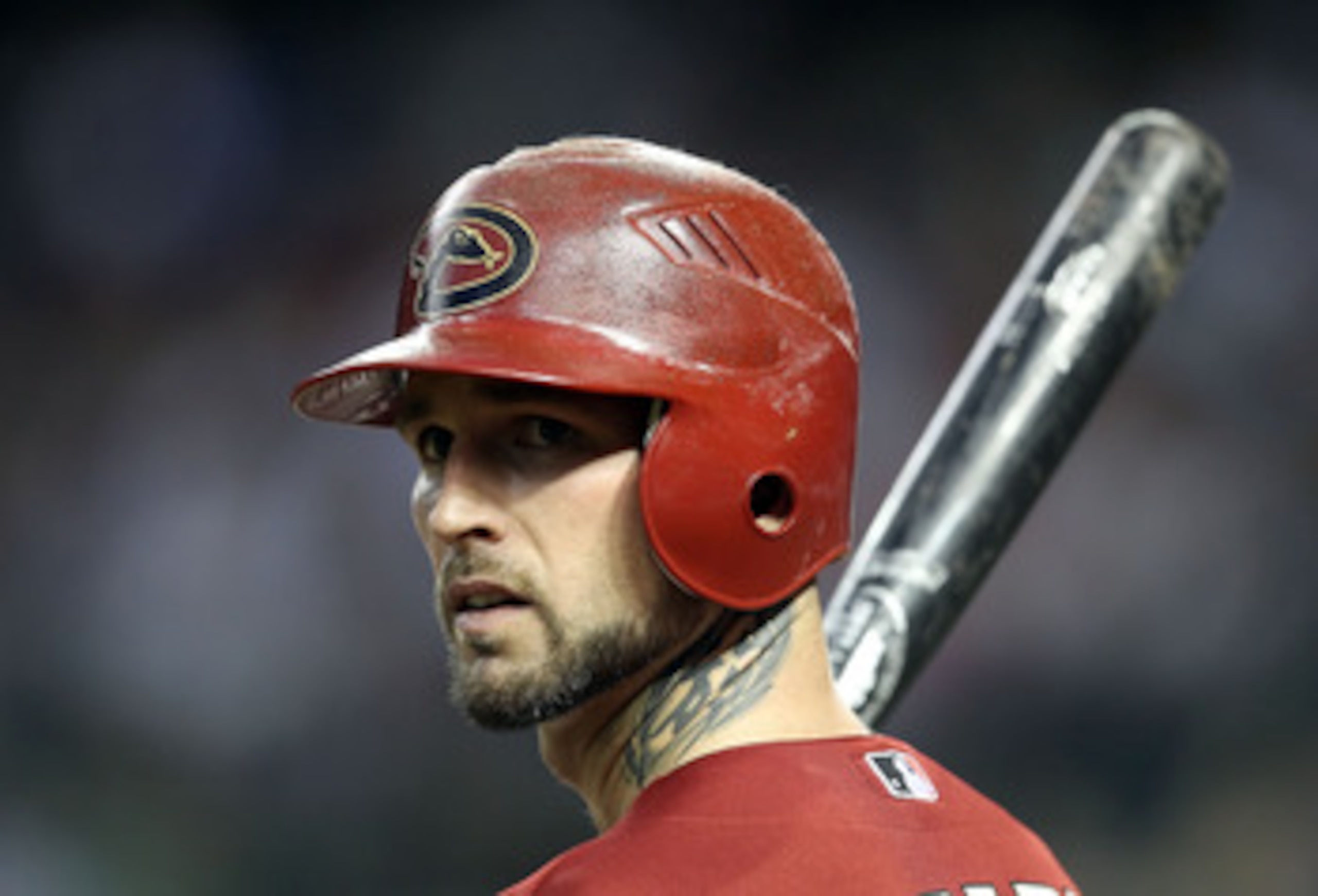 PHOENIX, AZ - JUNE 15:  Ryan Roberts #14 of the Arizona Diamondbacks warms up on deck during the Major League Baseball game against the San Francisco Giants at Chase Field on June 15, 2011 in Phoenix, Arizona.  (Photo by Christian Petersen/Getty Images)