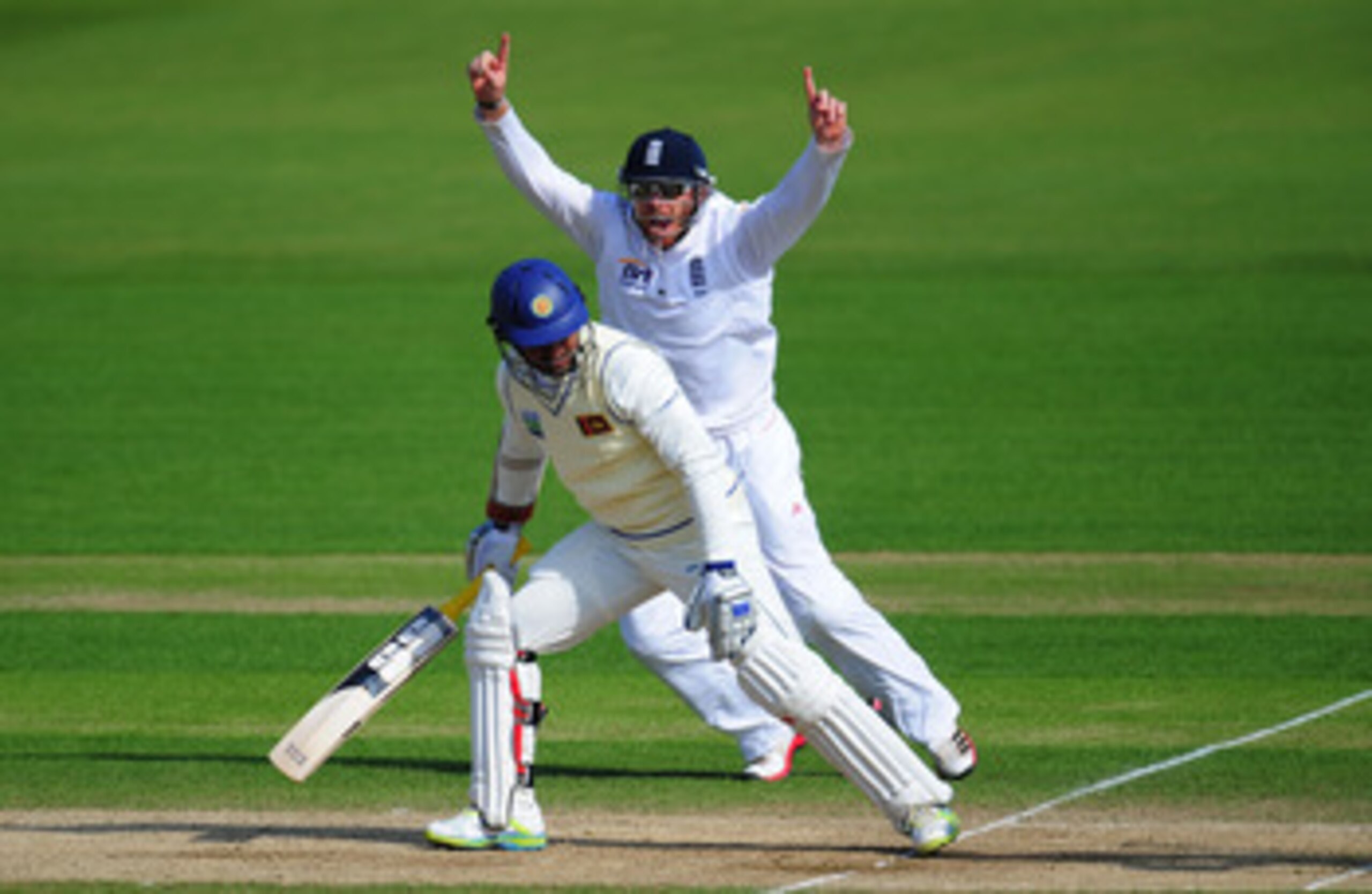 CARDIFF, WALES - MAY 30:  England fielder Ian Bell celebrates after Sri Lanka batsman Kumar Sangakkara is dismissed during day five of the 1st npower test match between England and Sri Lanka at the Swalec Stadium on May 30, 2011 in Cardiff, Wales.  (Photo