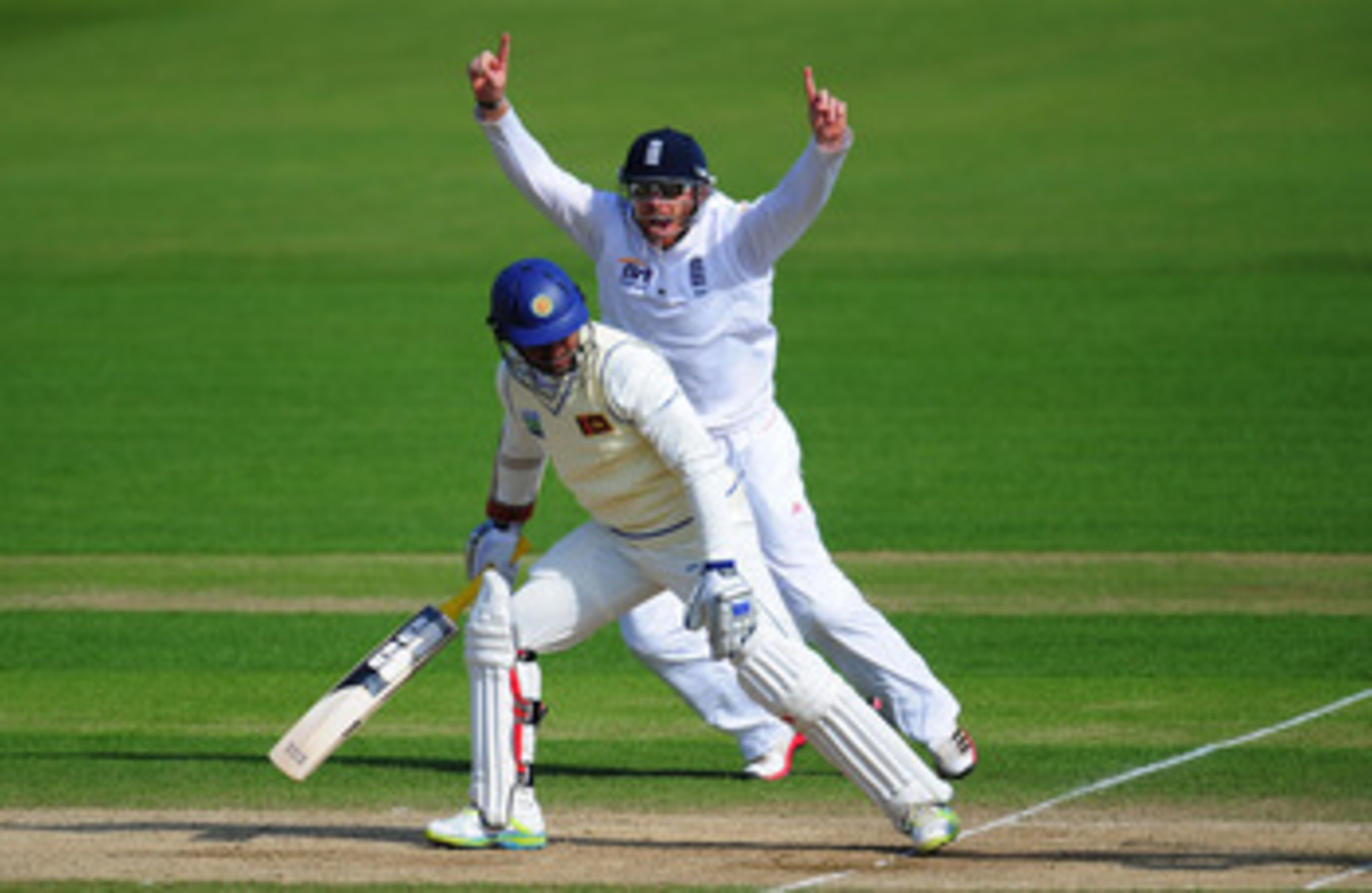CARDIFF, WALES - MAY 30:  England fielder Ian Bell celebrates after Sri Lanka batsman Kumar Sangakkara is dismissed during day five of the 1st npower test match between England and Sri Lanka at the Swalec Stadium on May 30, 2011 in Cardiff, Wales.  (Photo