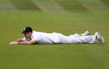 SOUTHAMPTON, ENGLAND - JUNE 20: Andrew Strauss of England lies on the ground as the ball rolls to the boundary during day five of the 3rd npower Test Match between England and Sri Lanka at the Rose Bowl on June 20, 2011 in Southampton, England.  (Photo by