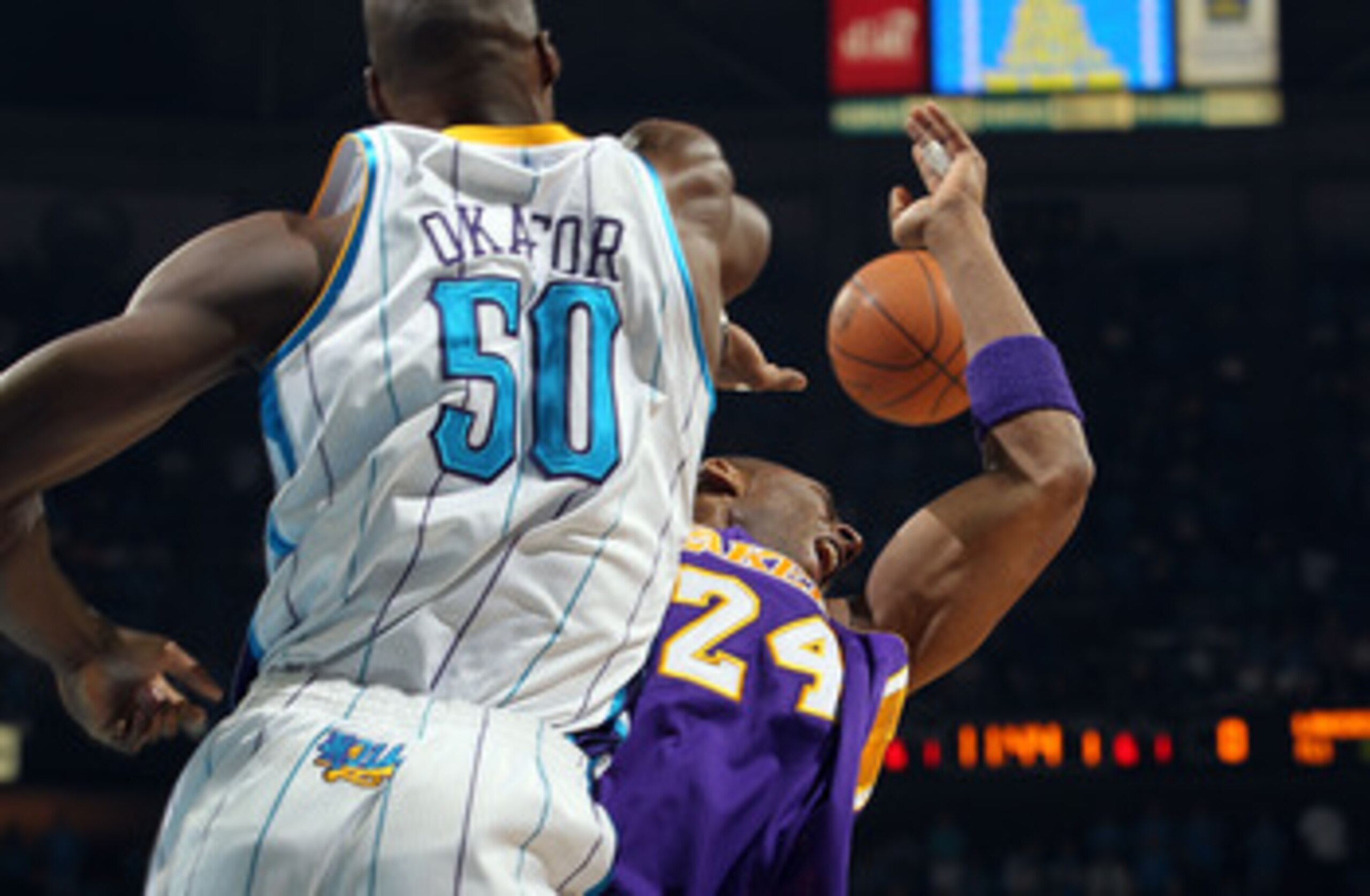 NEW ORLEANS, LA - APRIL 28: Kobe Bryant #24 of the Los Angeles Lakers is blocked by Emeka Okafor #50 of the New Orleans Hornets in Game Six of the Western Conference Quarterfinals in the 2011 NBA Playoffs on April 28, 2011 at New Orleans Arena in New Orl NEW ORLEANS, LA - APRIL 28: Kobe Bryant #24 of the Los Angeles Lakers is blocked by Emeka Okafor #50 of the New Orleans Hornets in Game Six of the Western Conference Quarterfinals in the 2011 NBA Playoffs on April 28, 2011 at New Orleans Arena in New Orl