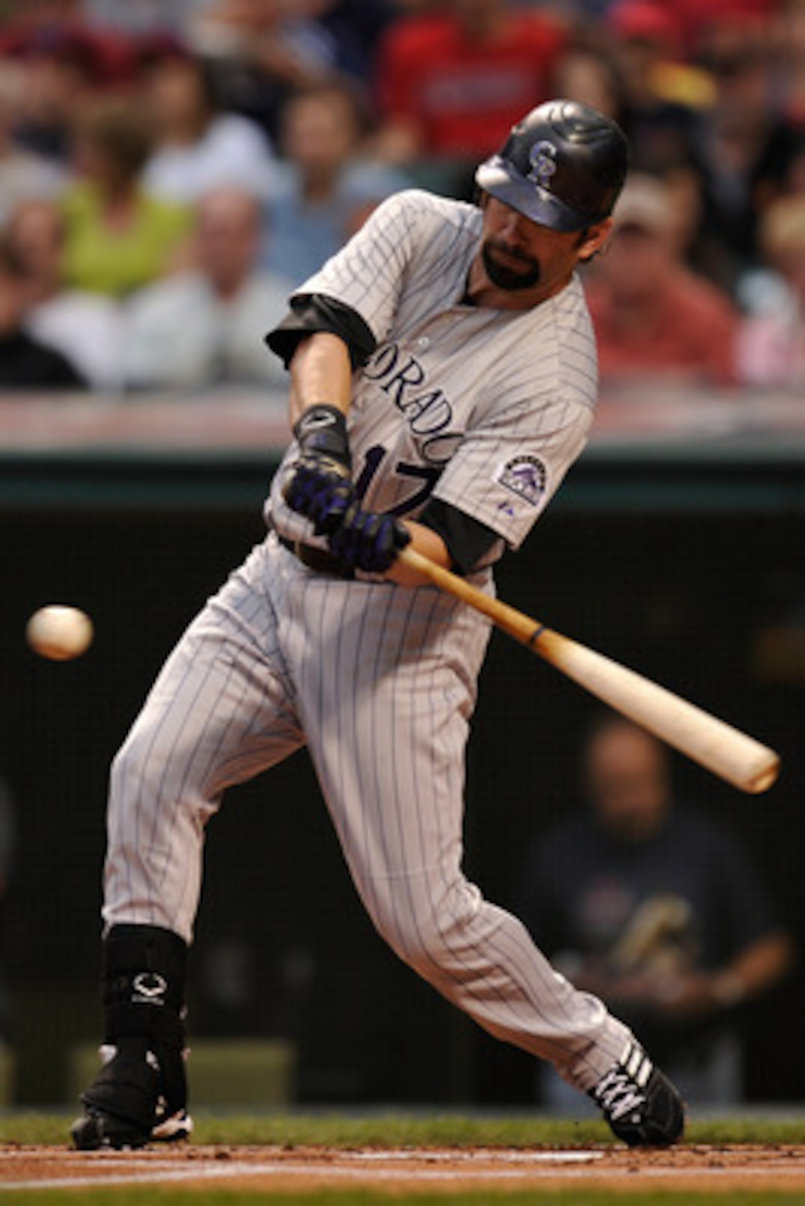 CLEVELAND, OH - JUNE 20:  Todd Helton #17 of the Colorado Rockies bats in the first inning against the Cleveland Indians at Progressive Field on June 20, 2011 in Cleveland, Ohio.  (Photo by Jamie Sabau/Getty Images)