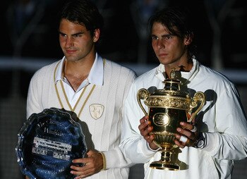LONDON - JULY 06:  Rafael Nadal of Spain and Roger Federer of Switzerland pose for pictures with after Nadal won in five sets in the final on day thirteen of the Wimbledon Lawn Tennis Championships at the All England Lawn Tennis and Croquet Club on July 6