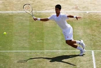 LONDON - JULY 07:  Novak Djokovic of Serbia plays a forehand during the Men's Singles semi-final match against Rafael Nadal of Spain during day twelve of the Wimbledon Lawn Tennis Championships at the All England Lawn Tennis and Croquet Club on July 7, 20