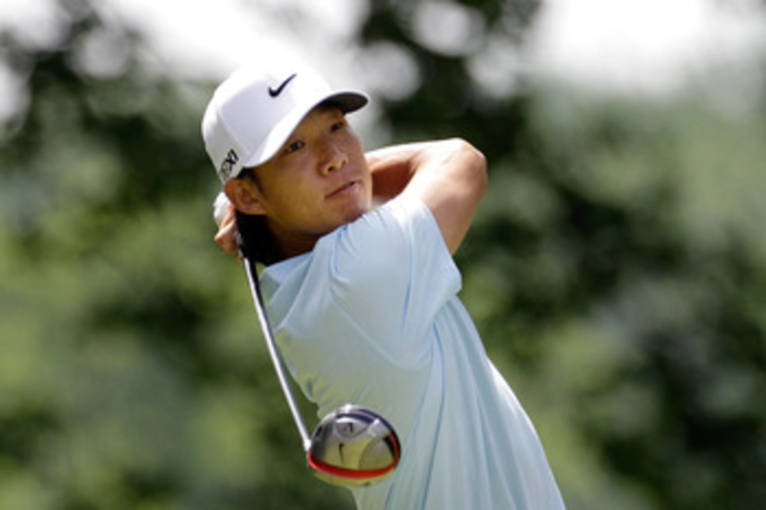 BETHESDA, MD - JUNE 18:  Anthony Kim hits his tee shot on the fourth hole during the third round of the 111th U.S. Open at Congressional Country Club on June 18, 2011 in Bethesda, Maryland.  (Photo by Rob Carr/Getty Images)