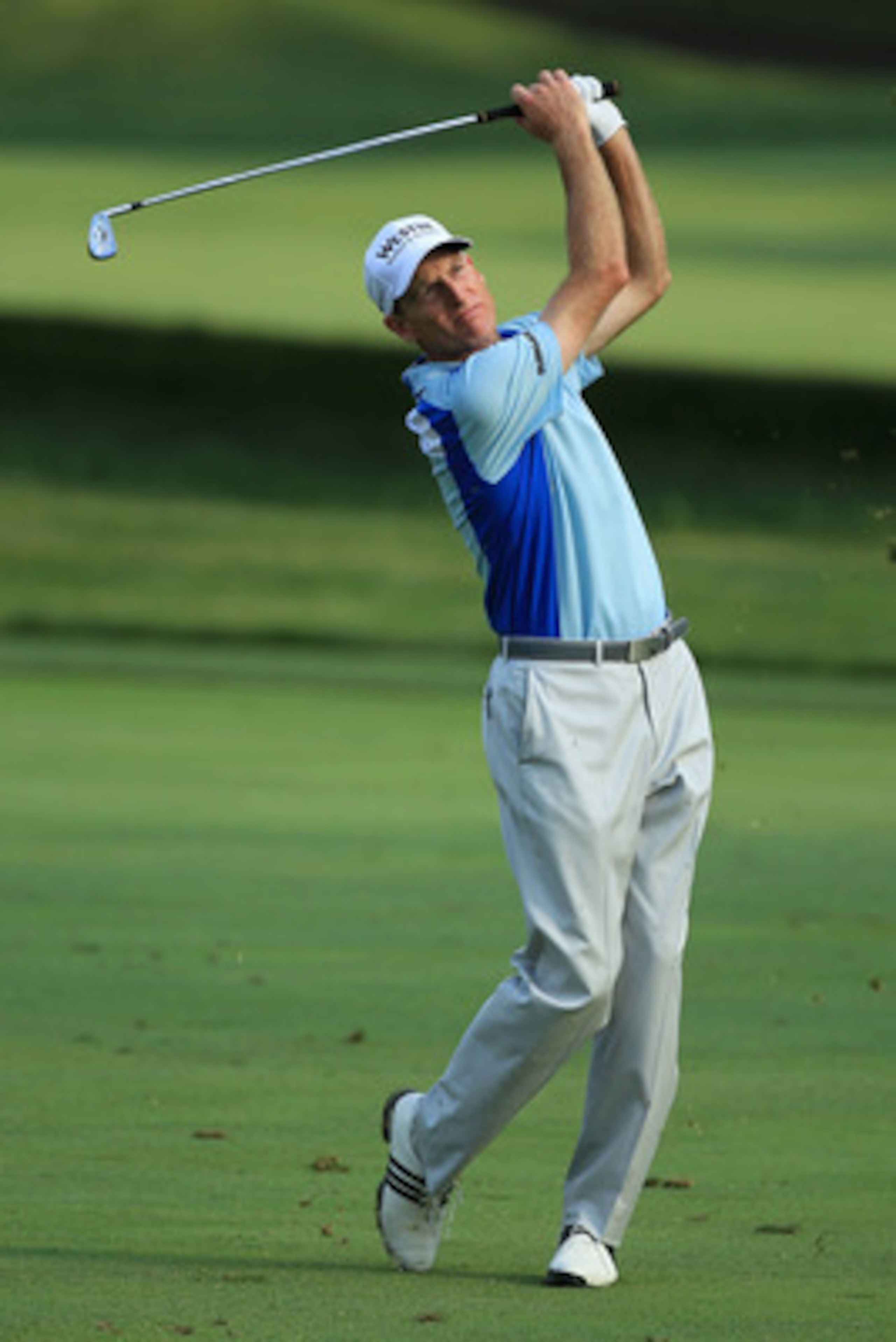 BETHESDA, MD - JUNE 17:  Jim Furyk hits his second shot on the fourth hole during the second round of the 111th U.S. Open at Congressional Country Club on June 17, 2011 in Bethesda, Maryland.  (Photo by David Cannon/Getty Images)
