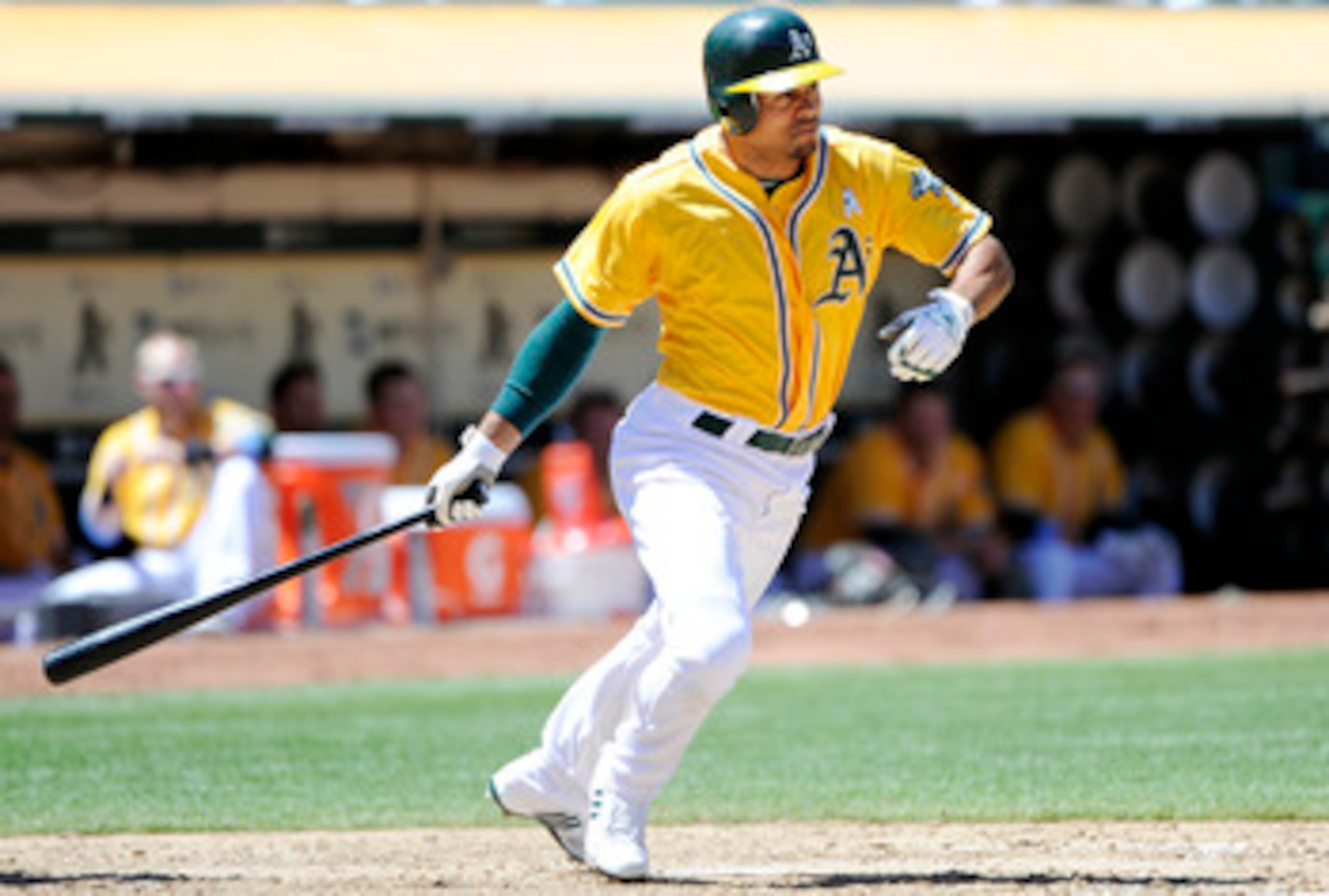 OAKLAND, CA -  JUNE 19: Coco Crisp #4 of the Oakland Athletics hits an RBI single against the San Francisco Giants in the bottom of the sixth inning during a MLB baseball game June 19, 2011 at the Oakland-Alameda County Coliseum in Oakland, California. (P