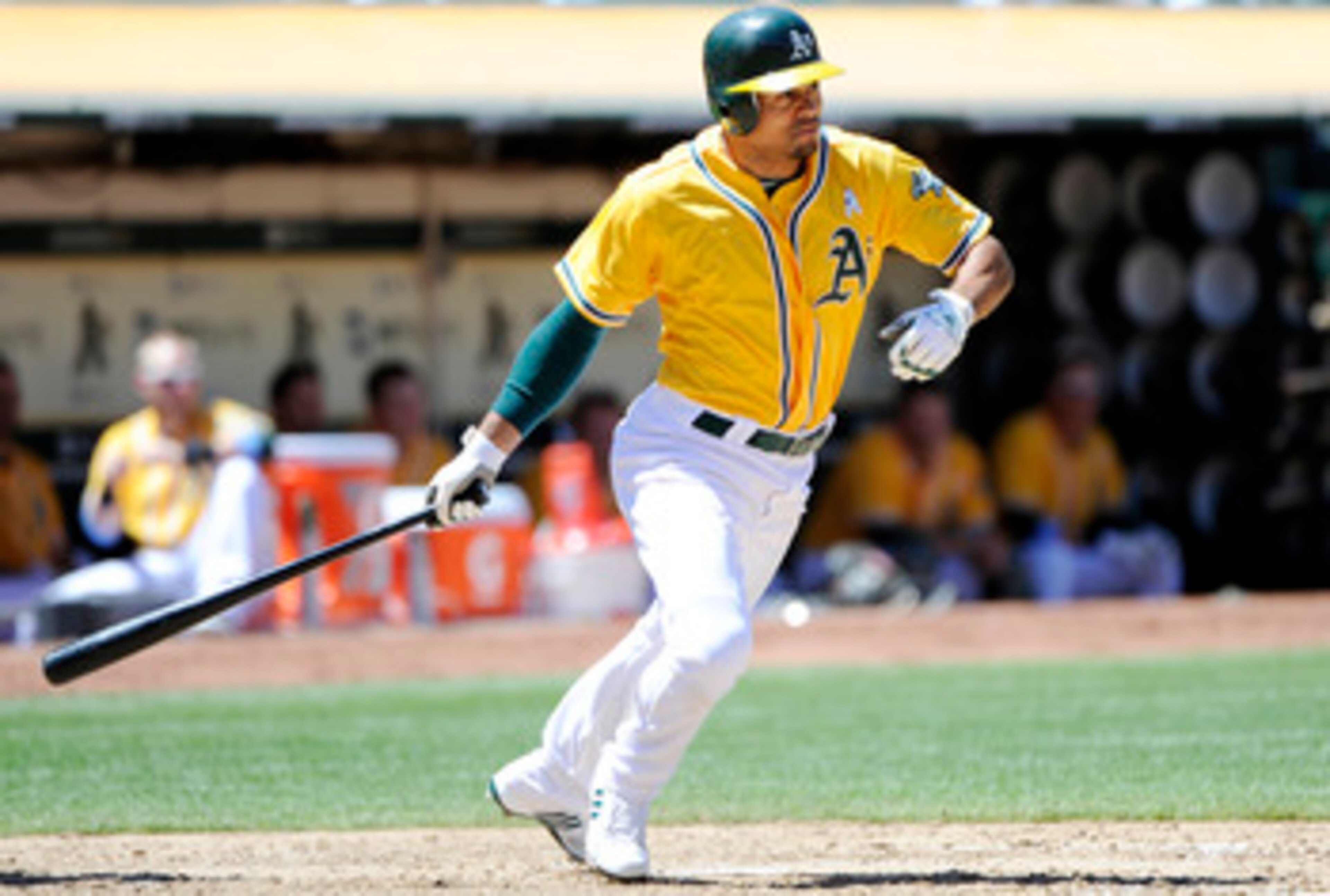 OAKLAND, CA -  JUNE 19: Coco Crisp #4 of the Oakland Athletics hits an RBI single against the San Francisco Giants in the bottom of the sixth inning during a MLB baseball game June 19, 2011 at the Oakland-Alameda County Coliseum in Oakland, California. (P