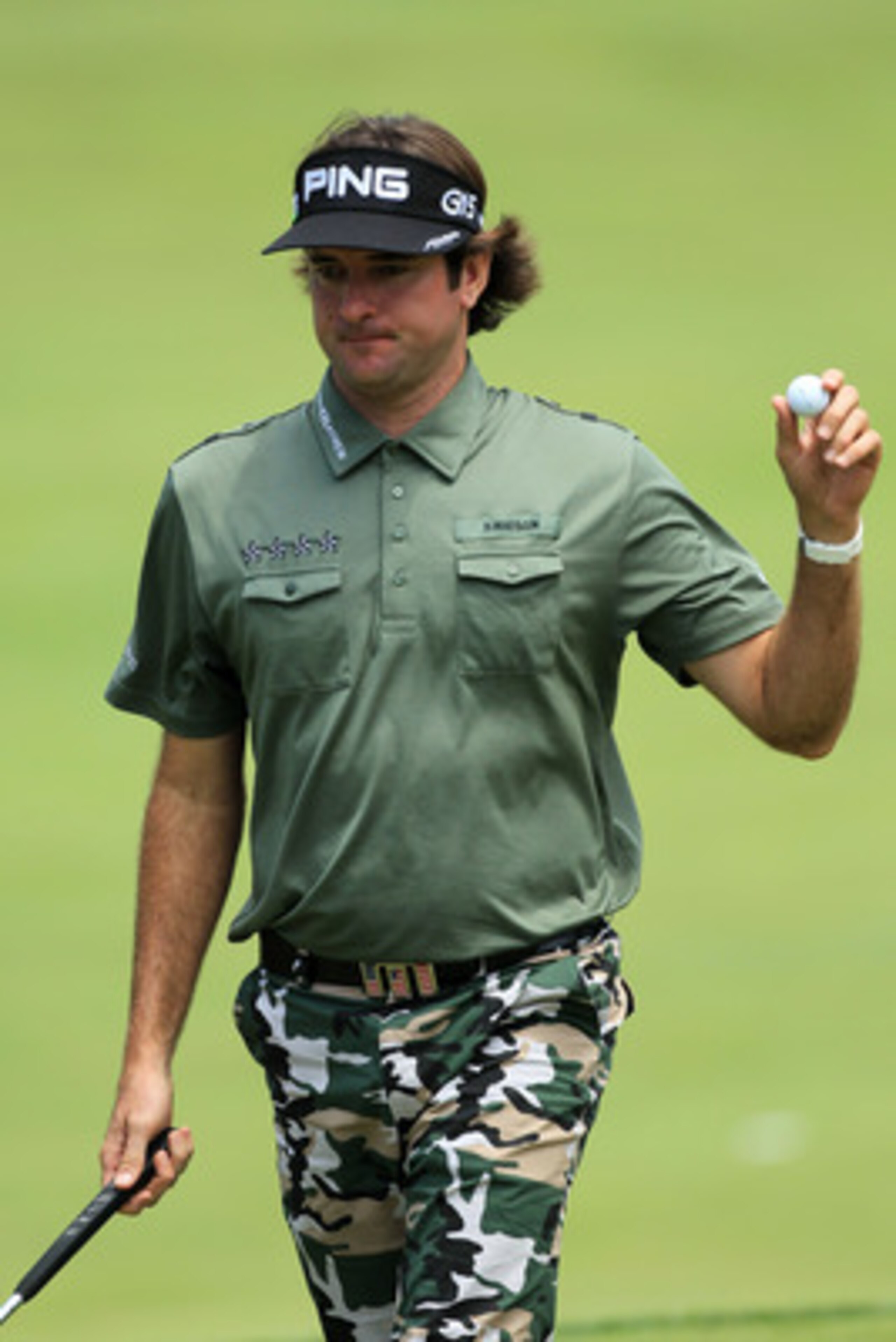 BETHESDA, MD - JUNE 16:  Bubba Watson waves to the gallery on the fifth green during the first round of the 111th U.S. Open at Congressional Country Club on June 16, 2011 in Bethesda, Maryland.  (Photo by David Cannon/Getty Images)