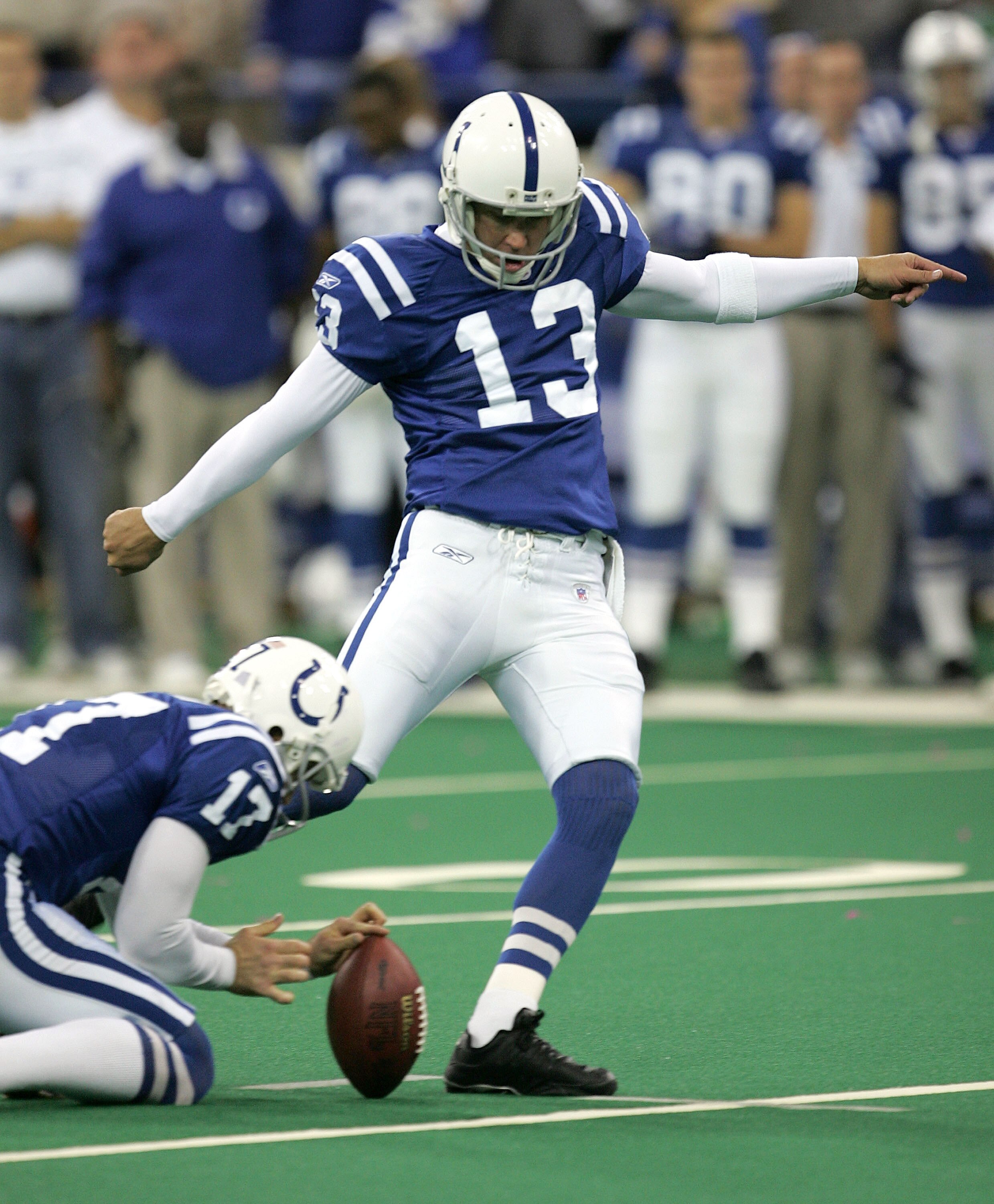 INDIANAPOLIS - NOVEMBER 8:  Mike Vanderjagt #13 of the Indianapolis Colts kicks the game-winning field goal against the Minnesota Vikings as holder Hunter Smith #17 places the ball on November 8, 2004 at the RCA Dome in Indianapolis, Indiana. The Colts de