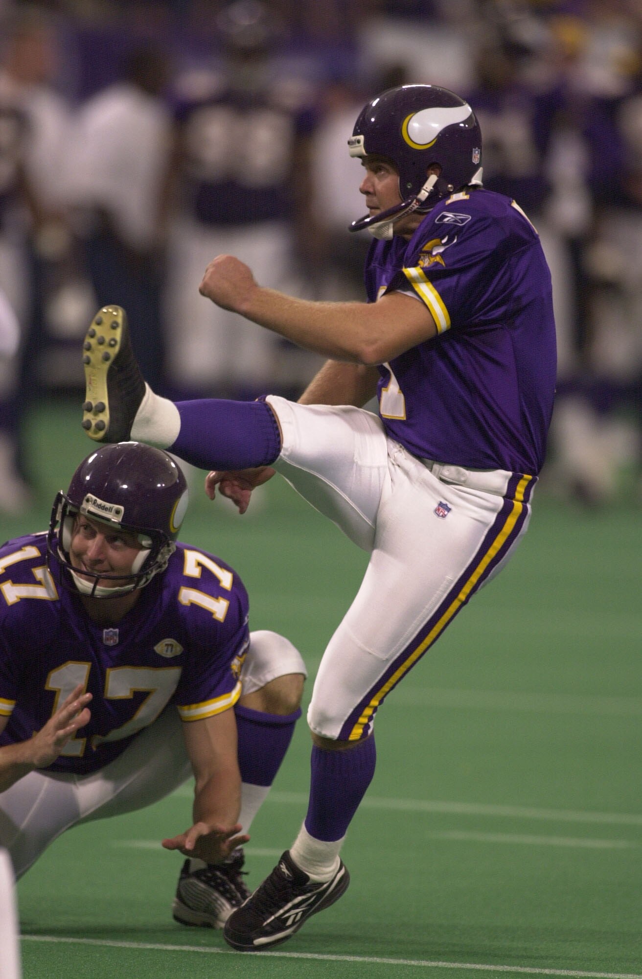 30 Sep 2001: Gary Anderson #1 of the Minnesota Vikings kicks a field goal as Mitch Berger #17 holds the ball during the game against the Tampa Bay Buccaneers at the Hubert H. Humphrey Metrodome in Minneapolis, Minnesota. The Vikings won 20-16. DIGITAL IMA