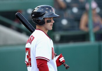 SCOTTSDALE, AZ - OCTOBER 23:  Washington Nationals prospect Bryce Harper #34 playing for the Scottsdale Scorpions warms up on deck during the AZ Fall League game against the Phoenix Desert Dogs at Scottsdale Stadium on October 23, 2010 in Scottsdale, Ariz