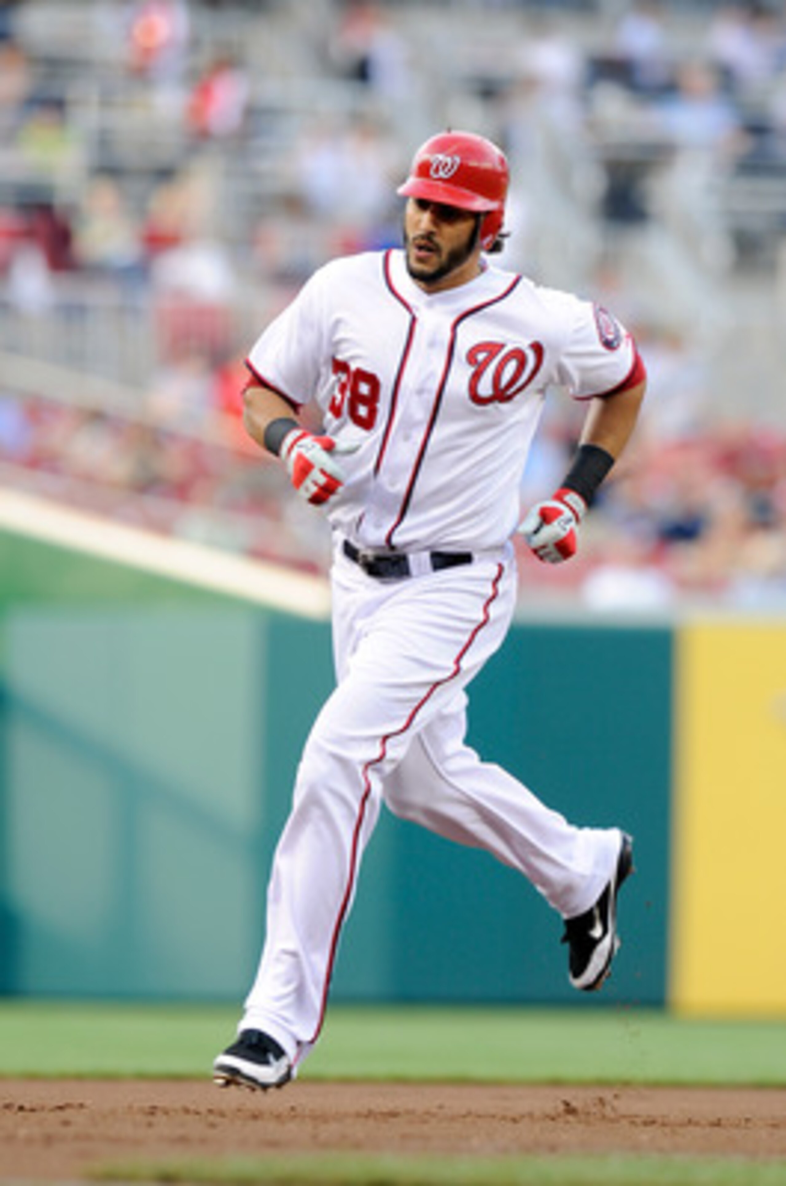 WASHINGTON, DC - JUNE 15:  Michael Morse #38 of the Washington Nationals rounds the bases after hitting a home run in the second inning against the St. Louis Cardinals at Nationals Park on June 15, 2011 in Washington, DC.  (Photo by Greg Fiume/Getty Image